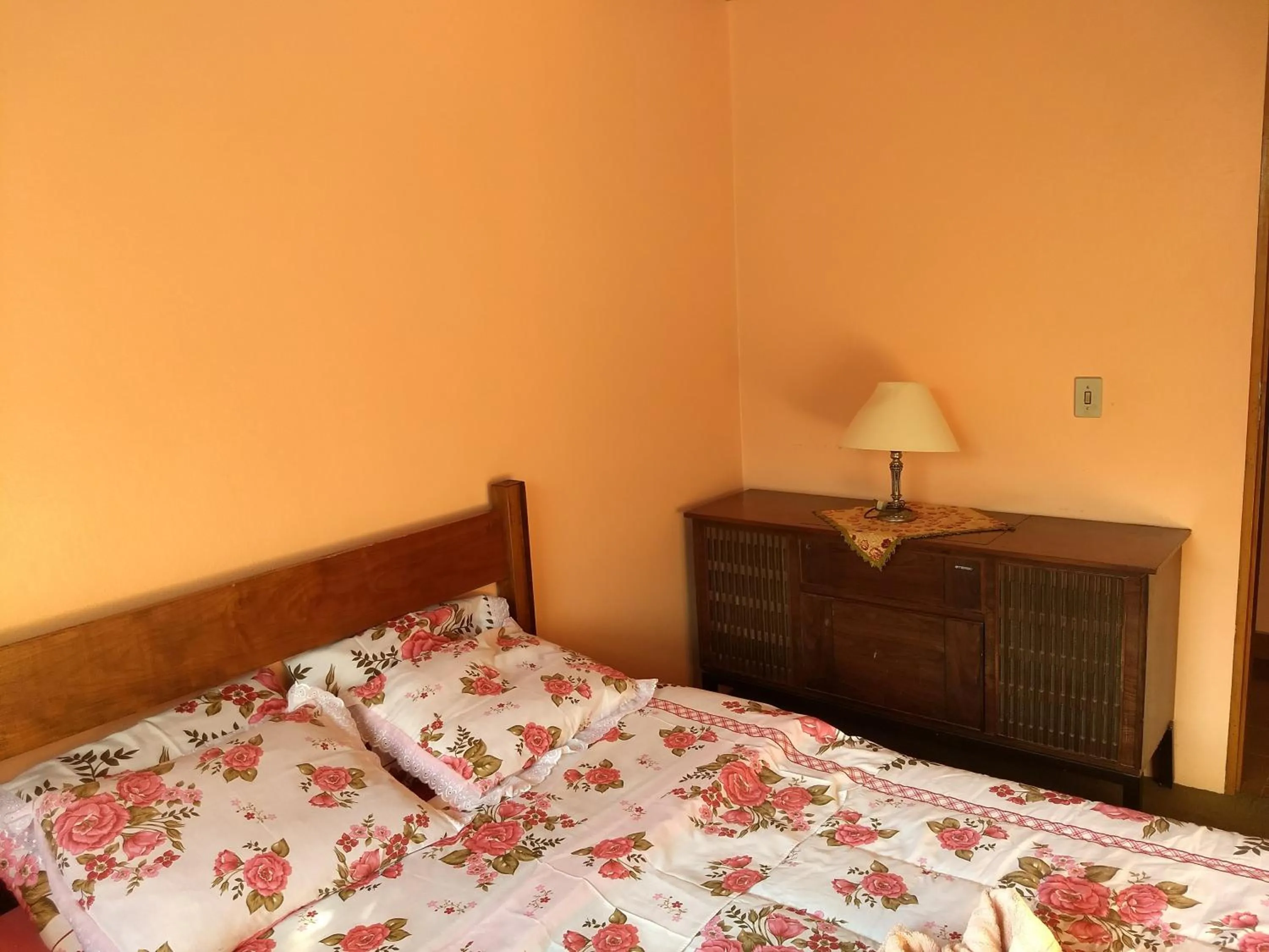 Bed in Pousada Pedra da Gávea