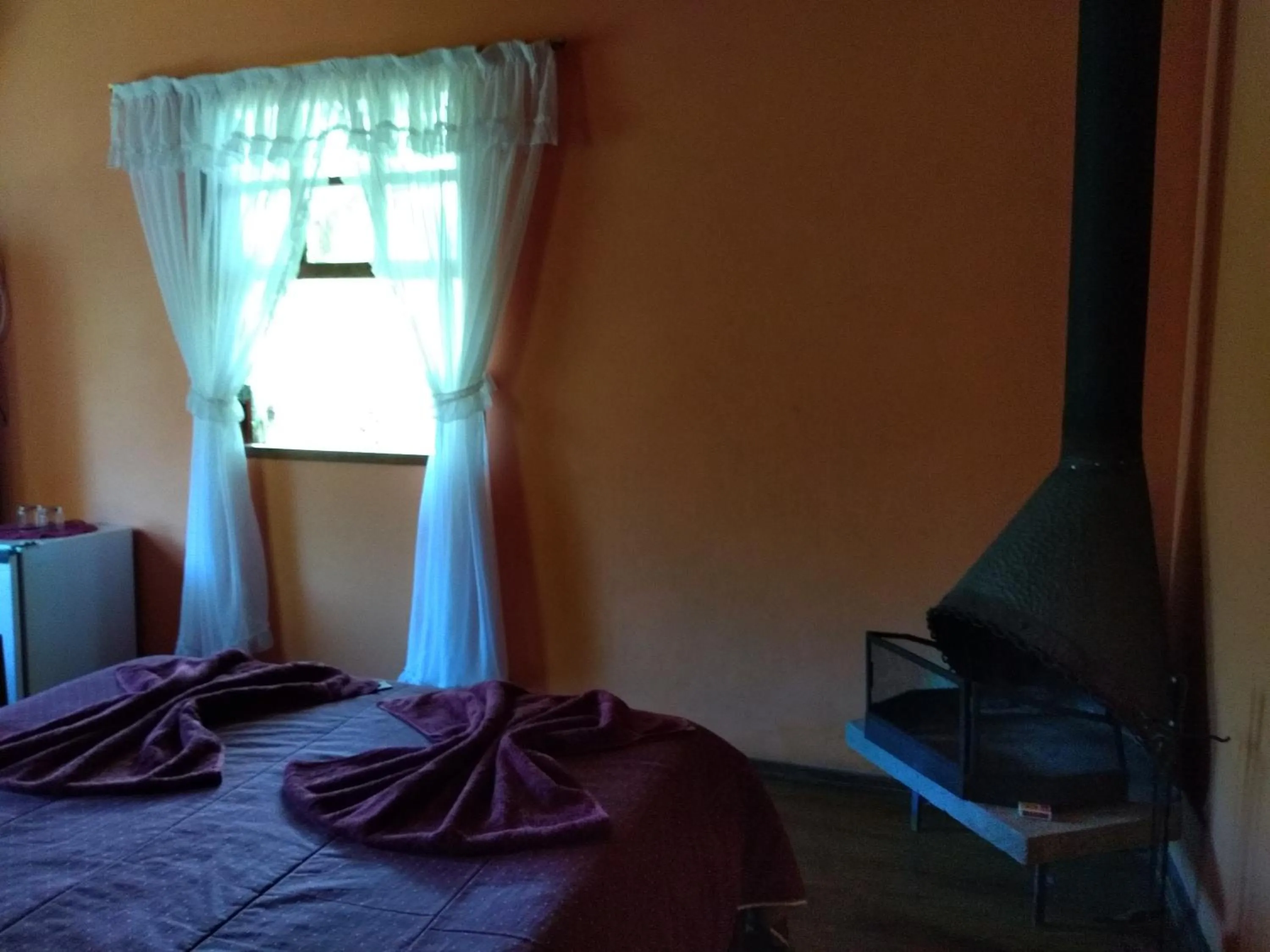 Bed in Pousada Pedra da Gávea