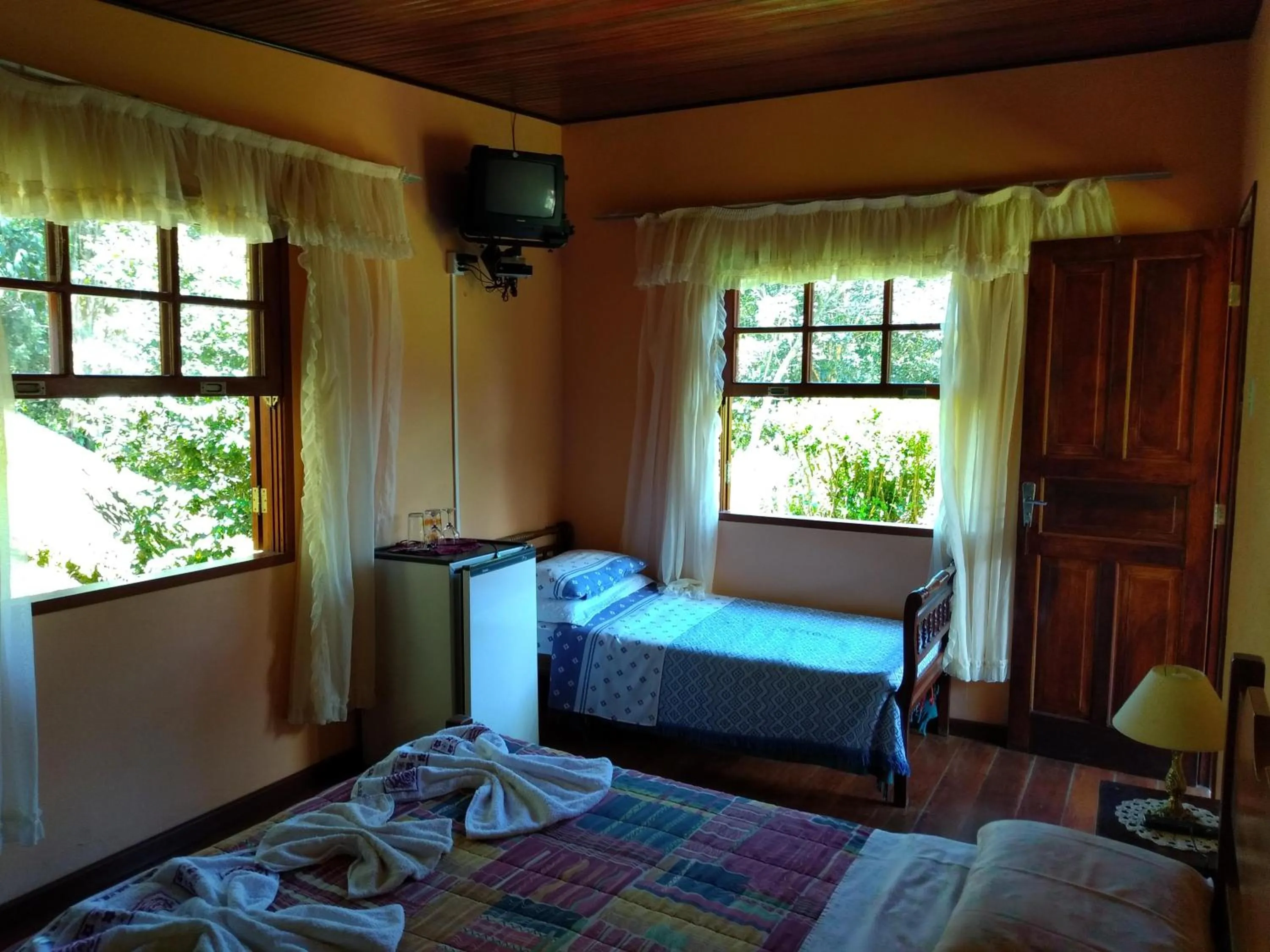Bed in Pousada Pedra da Gávea
