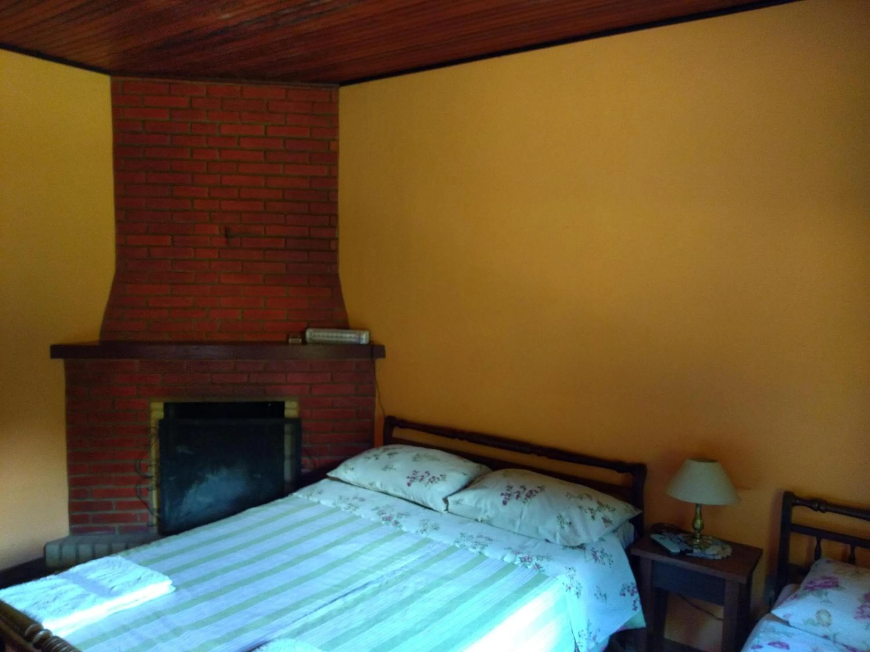 Bed in Pousada Pedra da Gávea