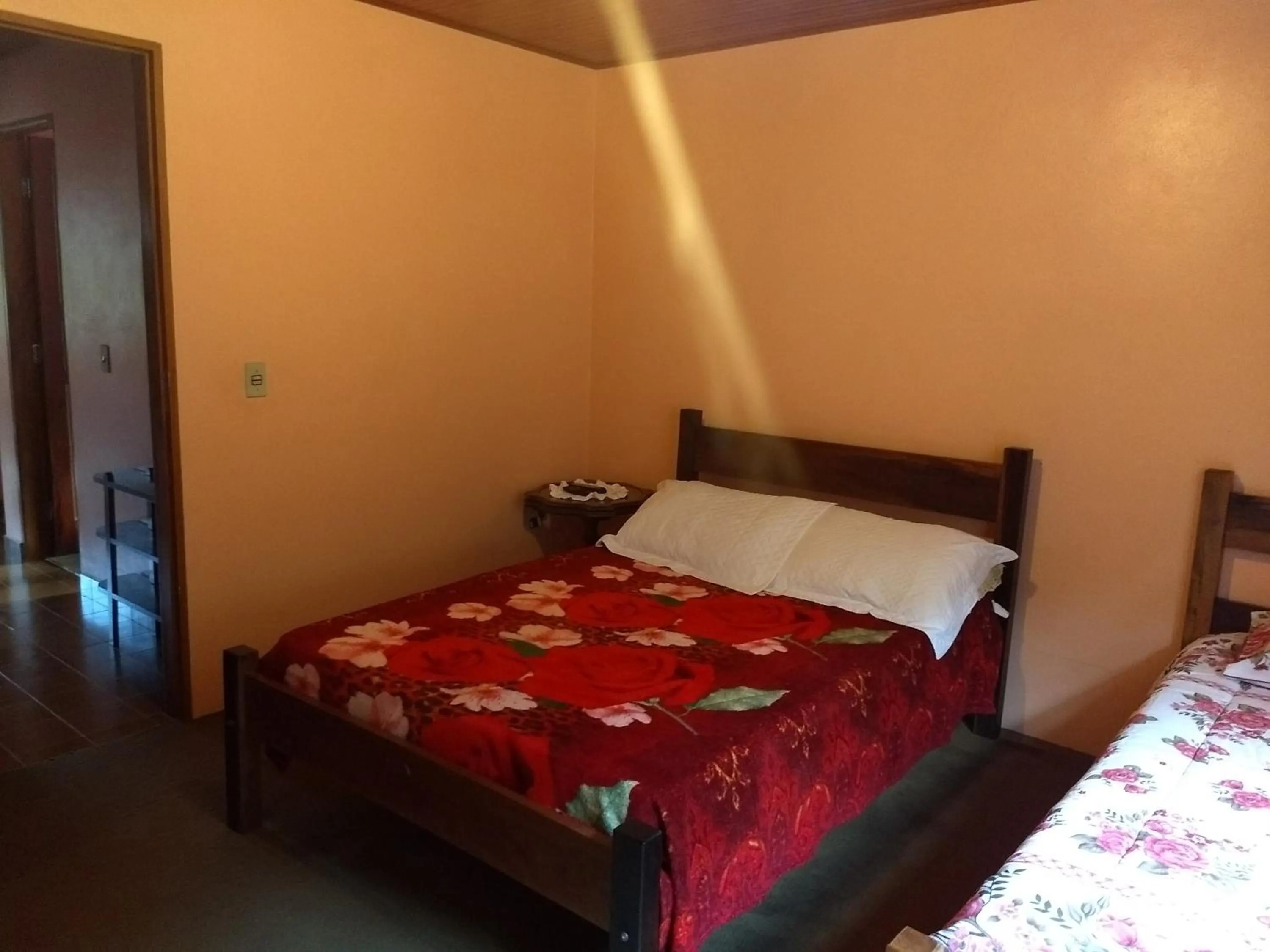 Bed in Pousada Pedra da Gávea