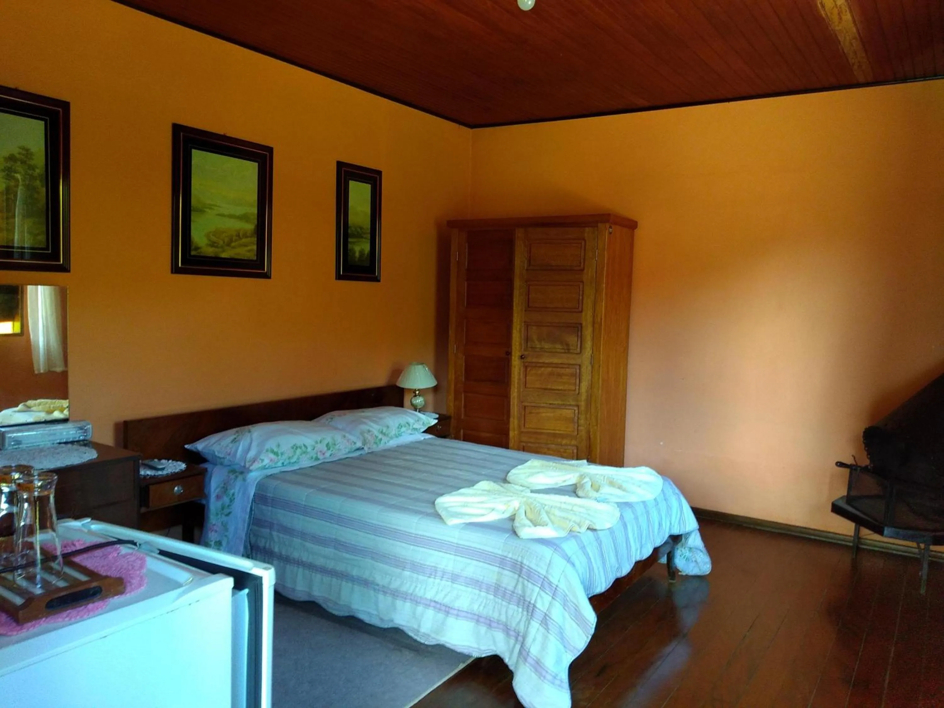 Bed in Pousada Pedra da Gávea