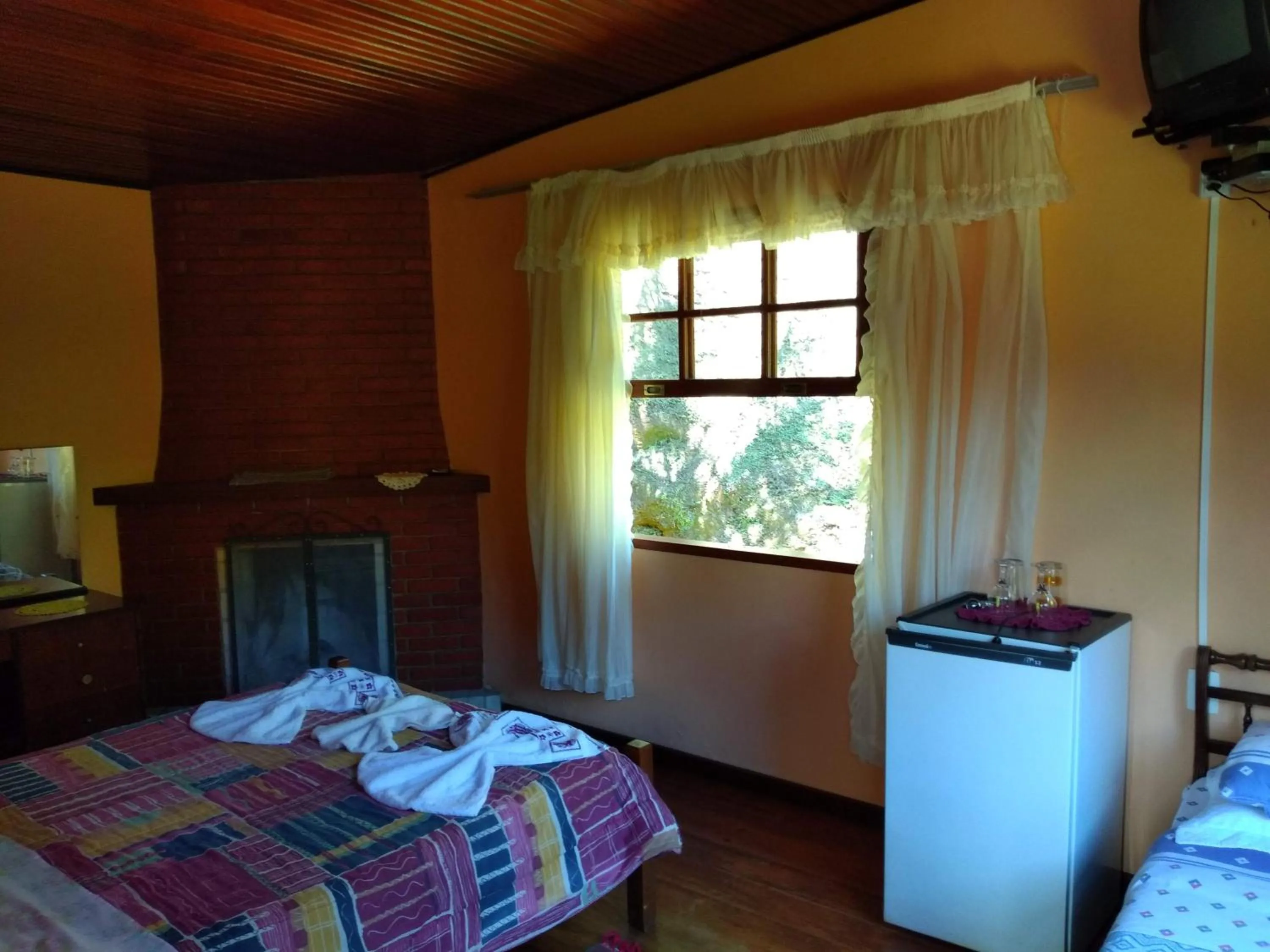 Bed in Pousada Pedra da Gávea
