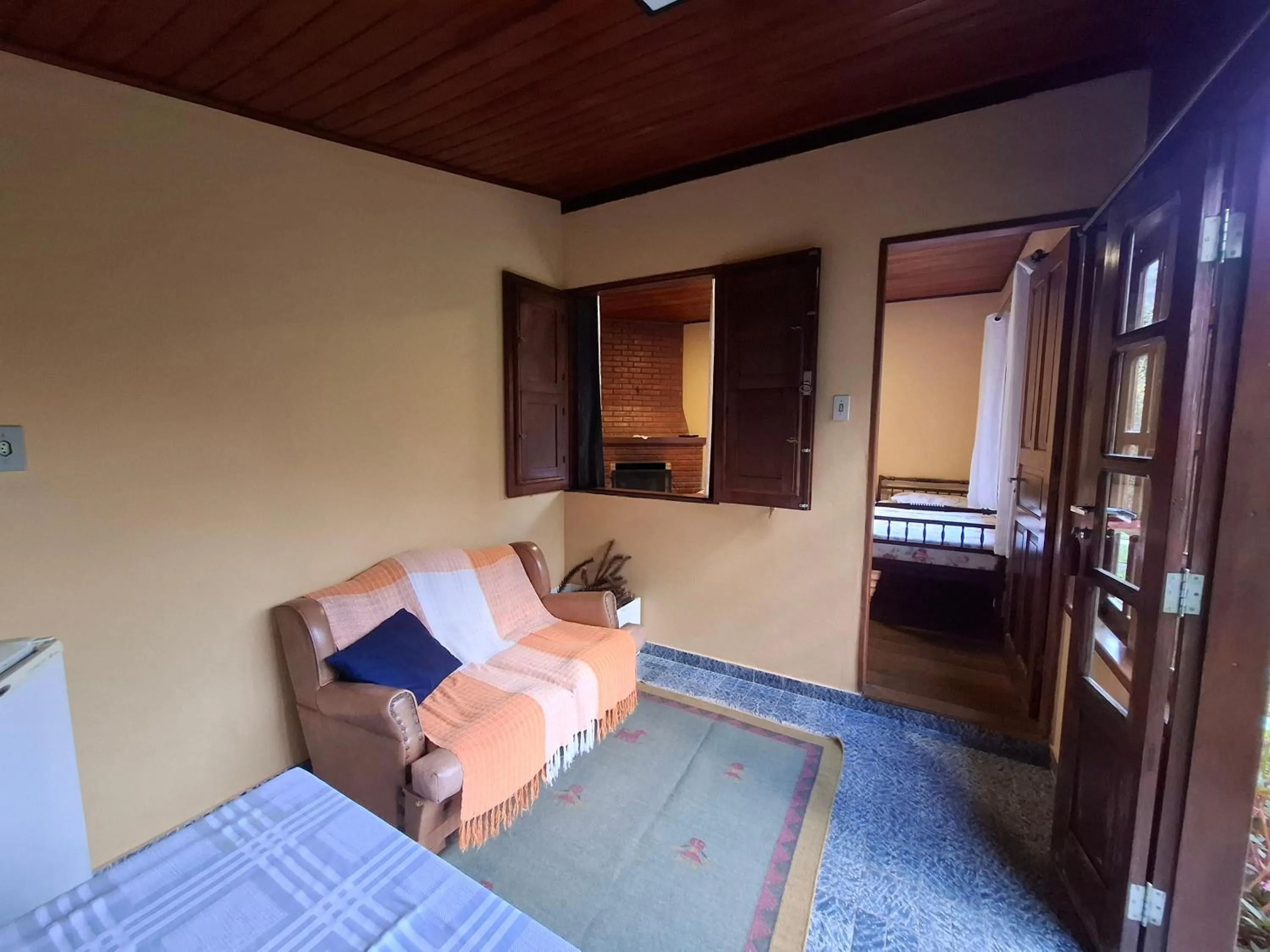 Living room, Bed in Pousada Pedra da Gávea