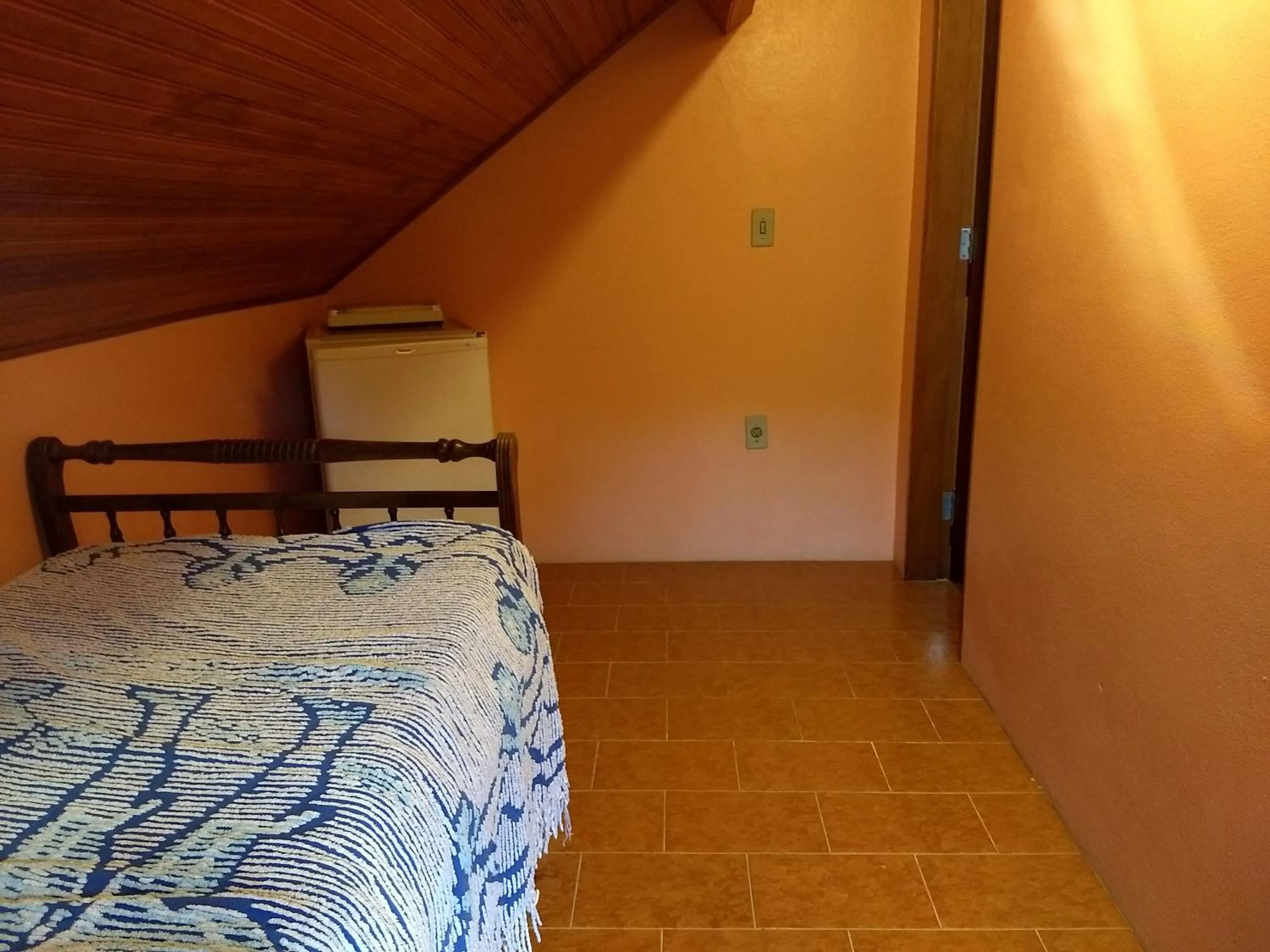 Bed in Pousada Pedra da Gávea