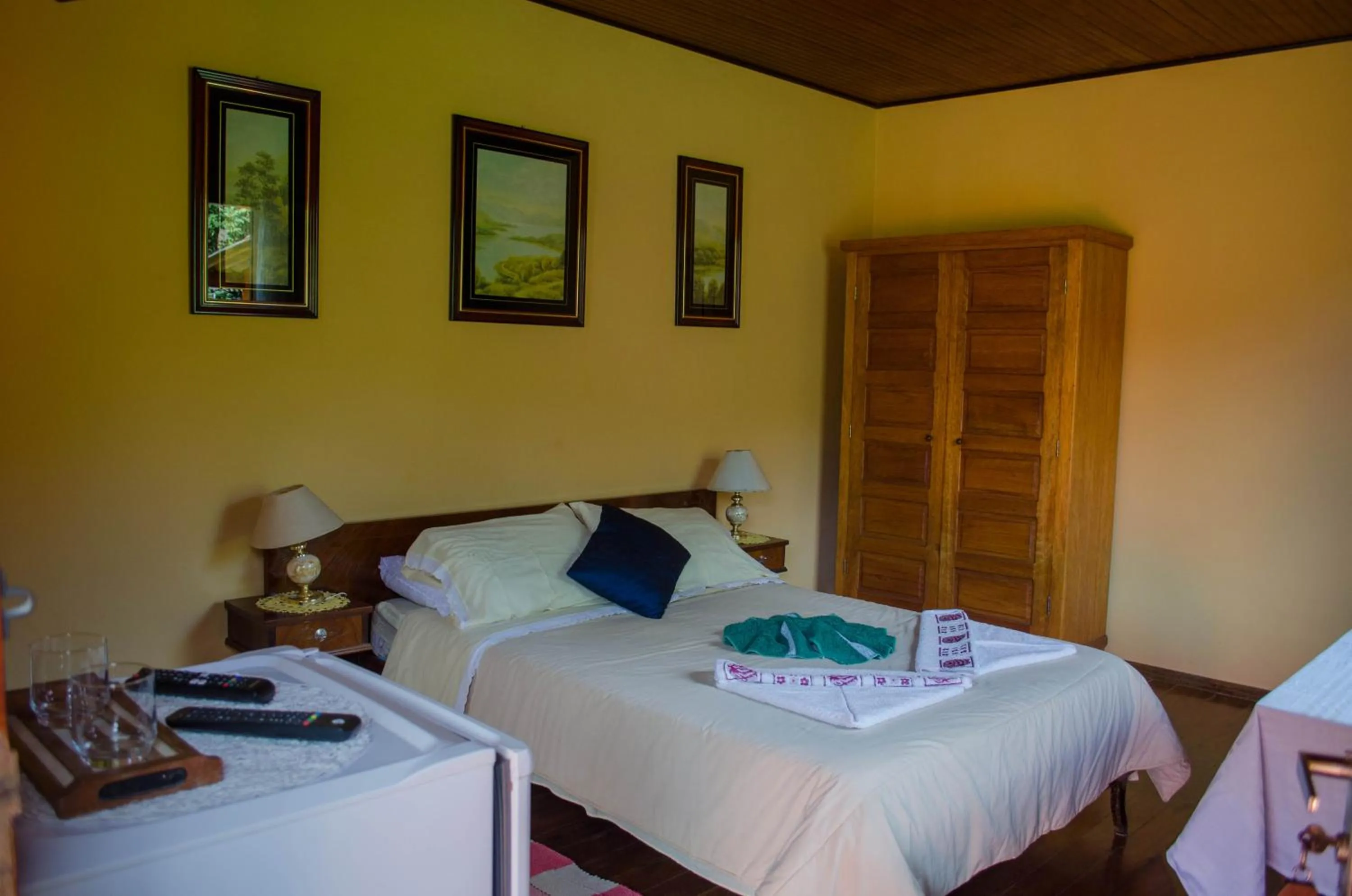 Bed in Pousada Pedra da Gávea