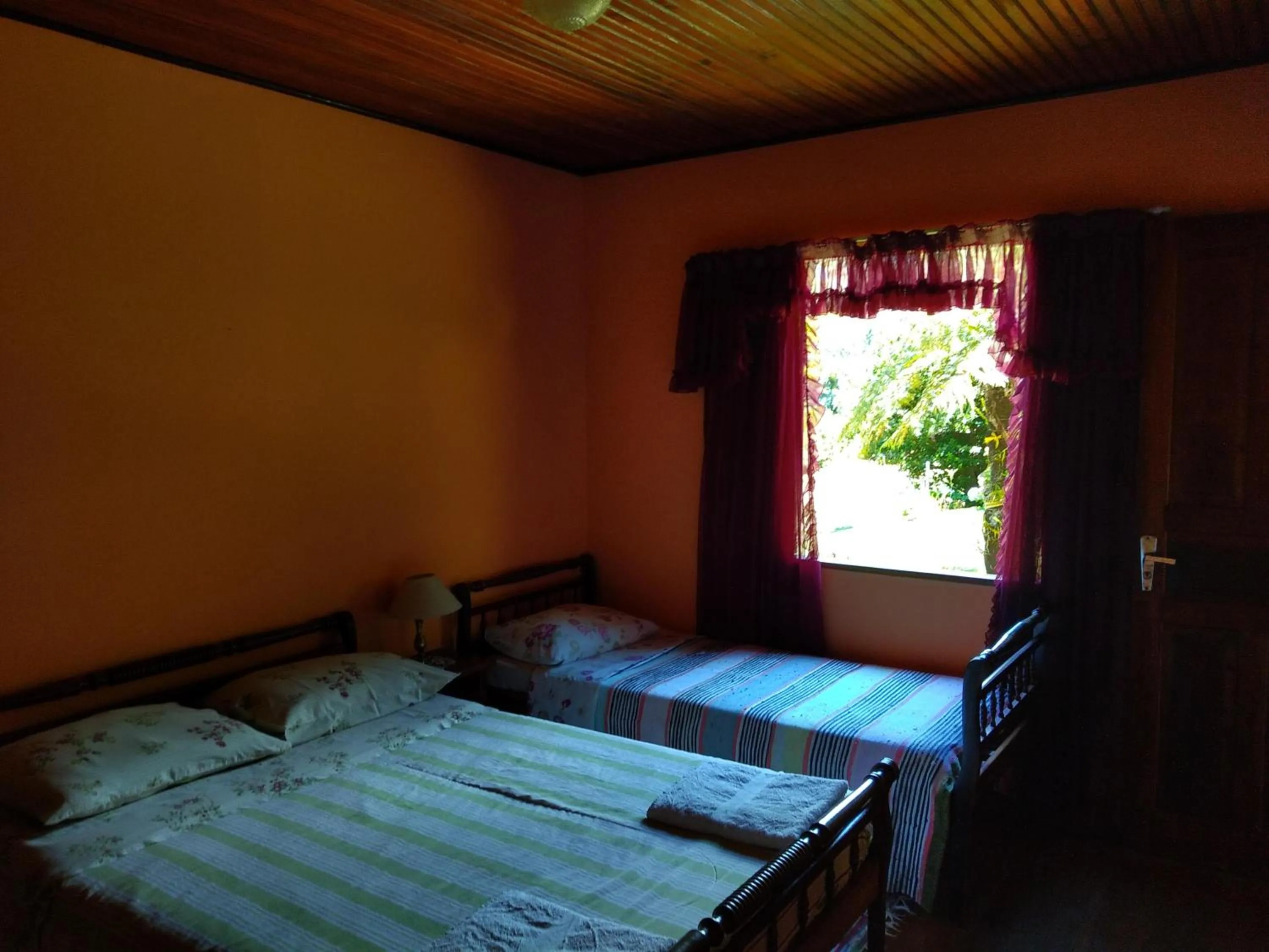 Bed in Pousada Pedra da Gávea