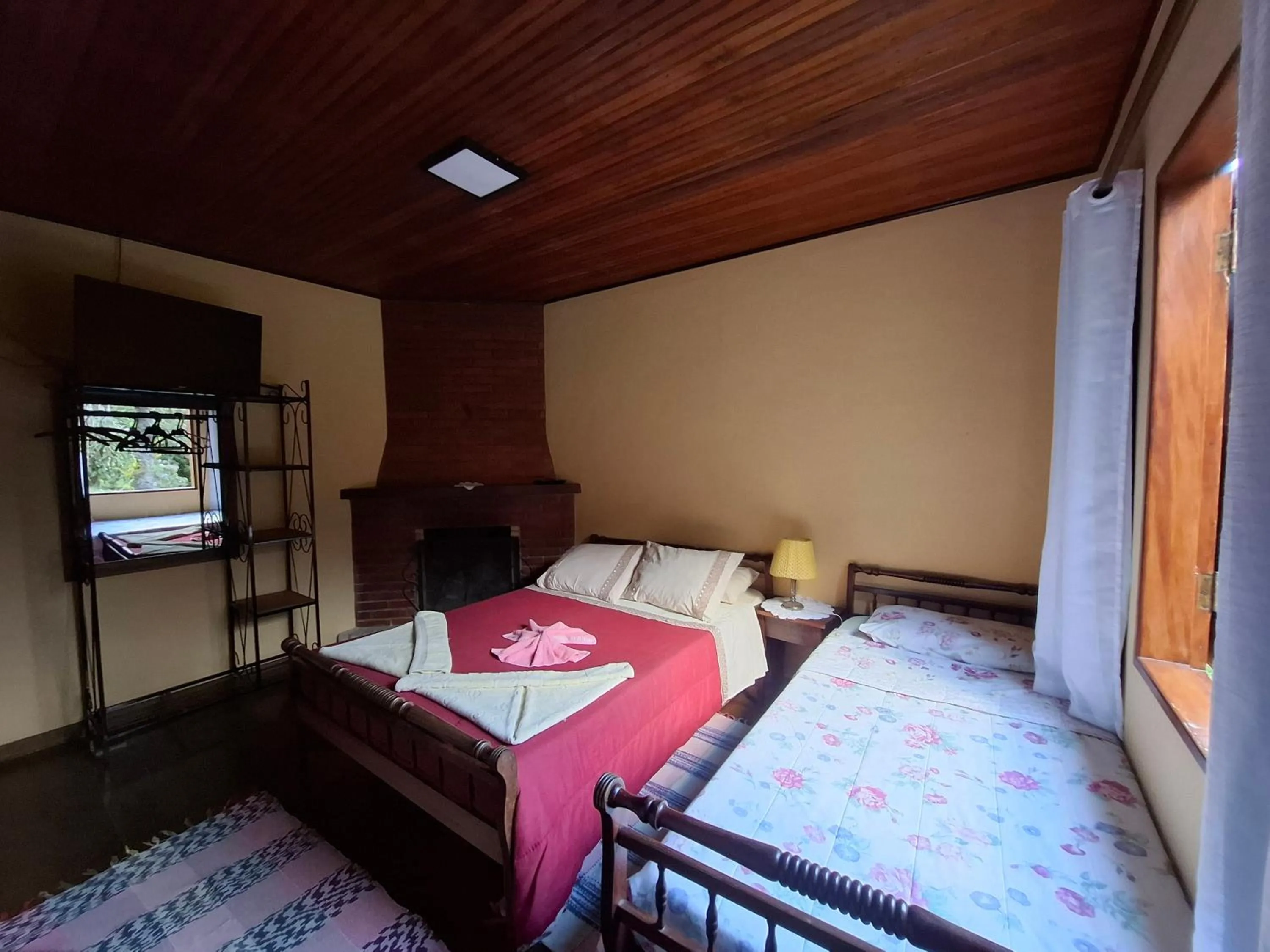 Bed in Pousada Pedra da Gávea