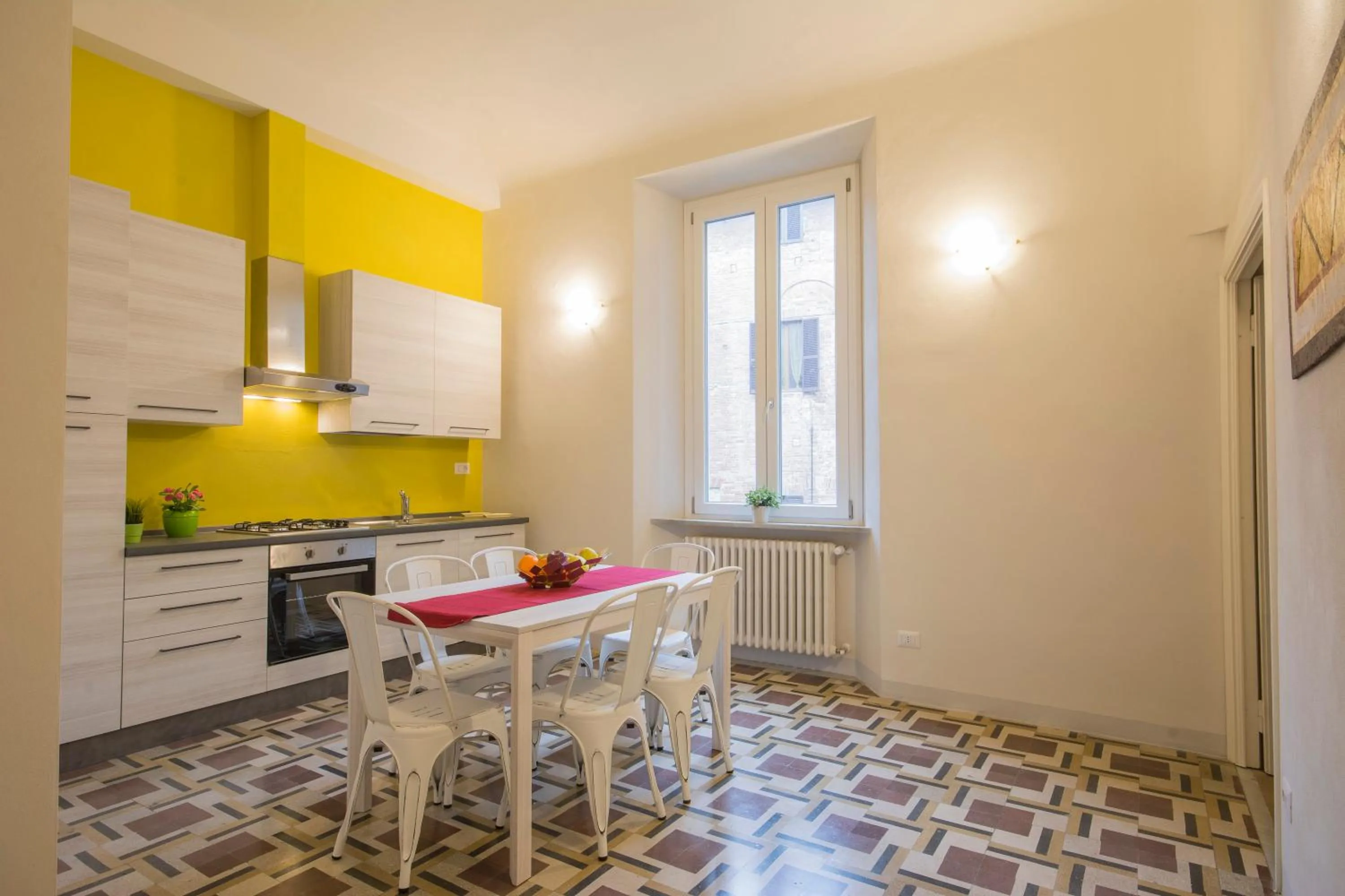Dining area in Piazza Paradiso Accommodation