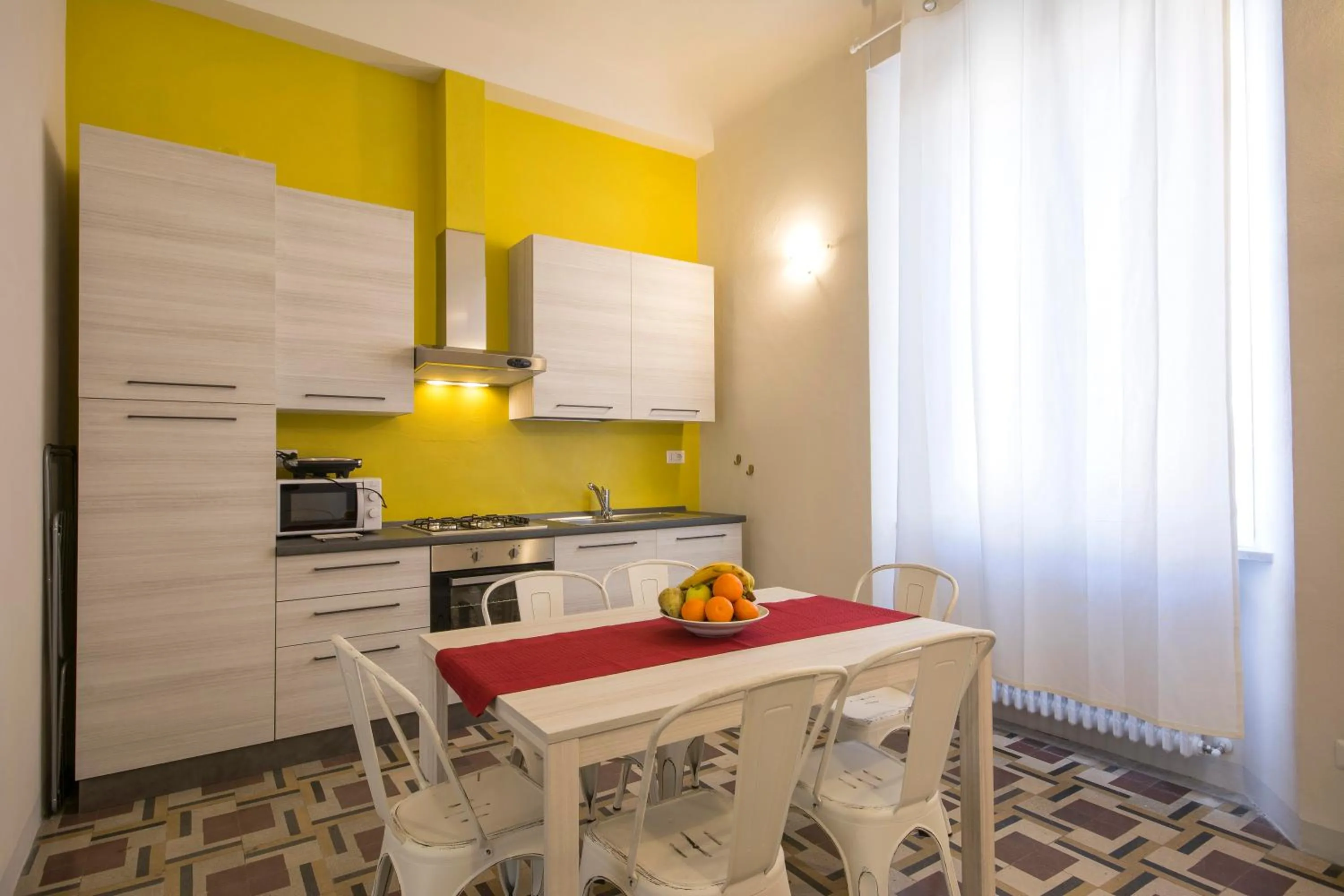 Kitchen or kitchenette in Piazza Paradiso Accommodation