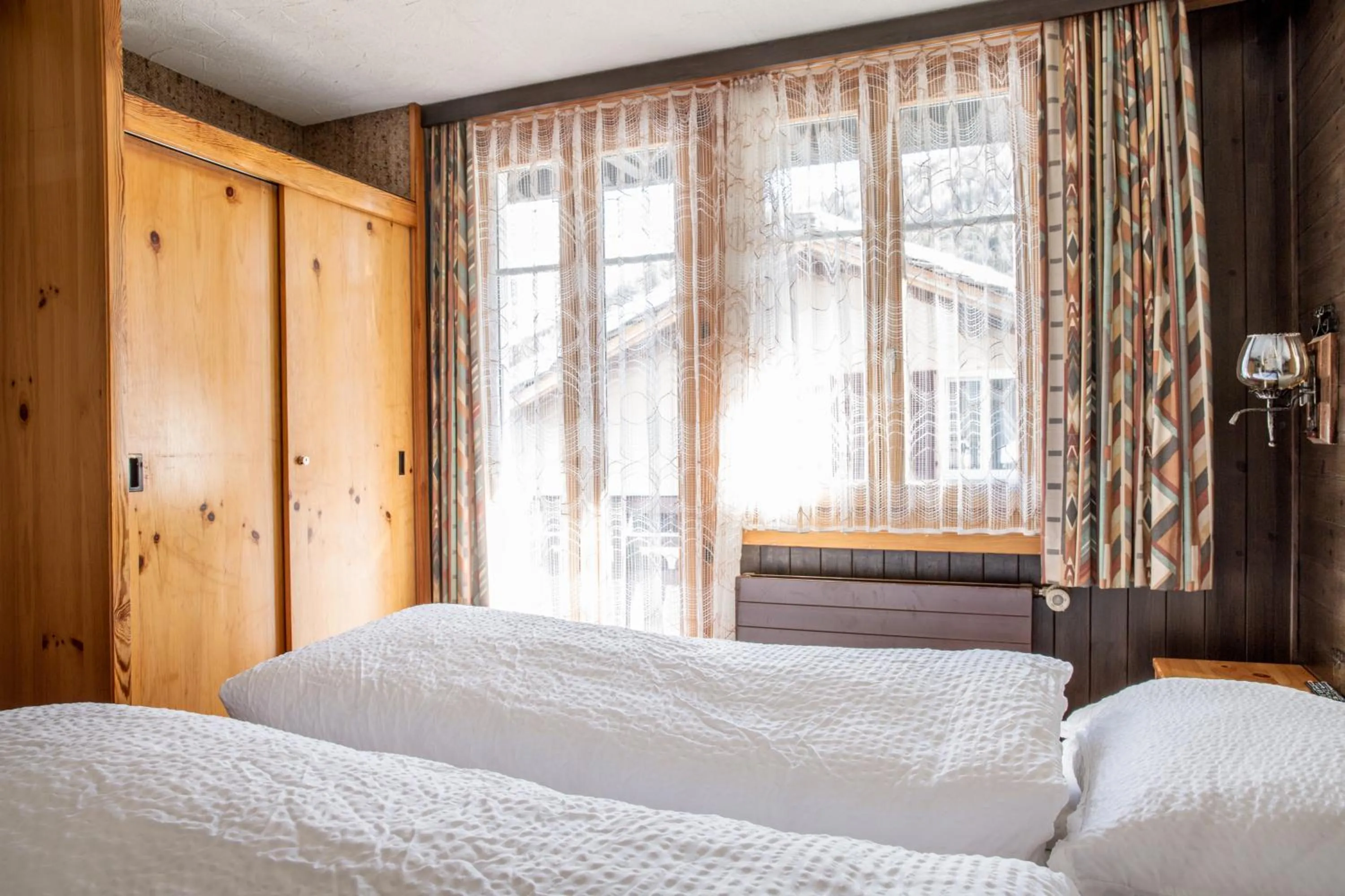 Bedroom, Bed in Hotel Burgener