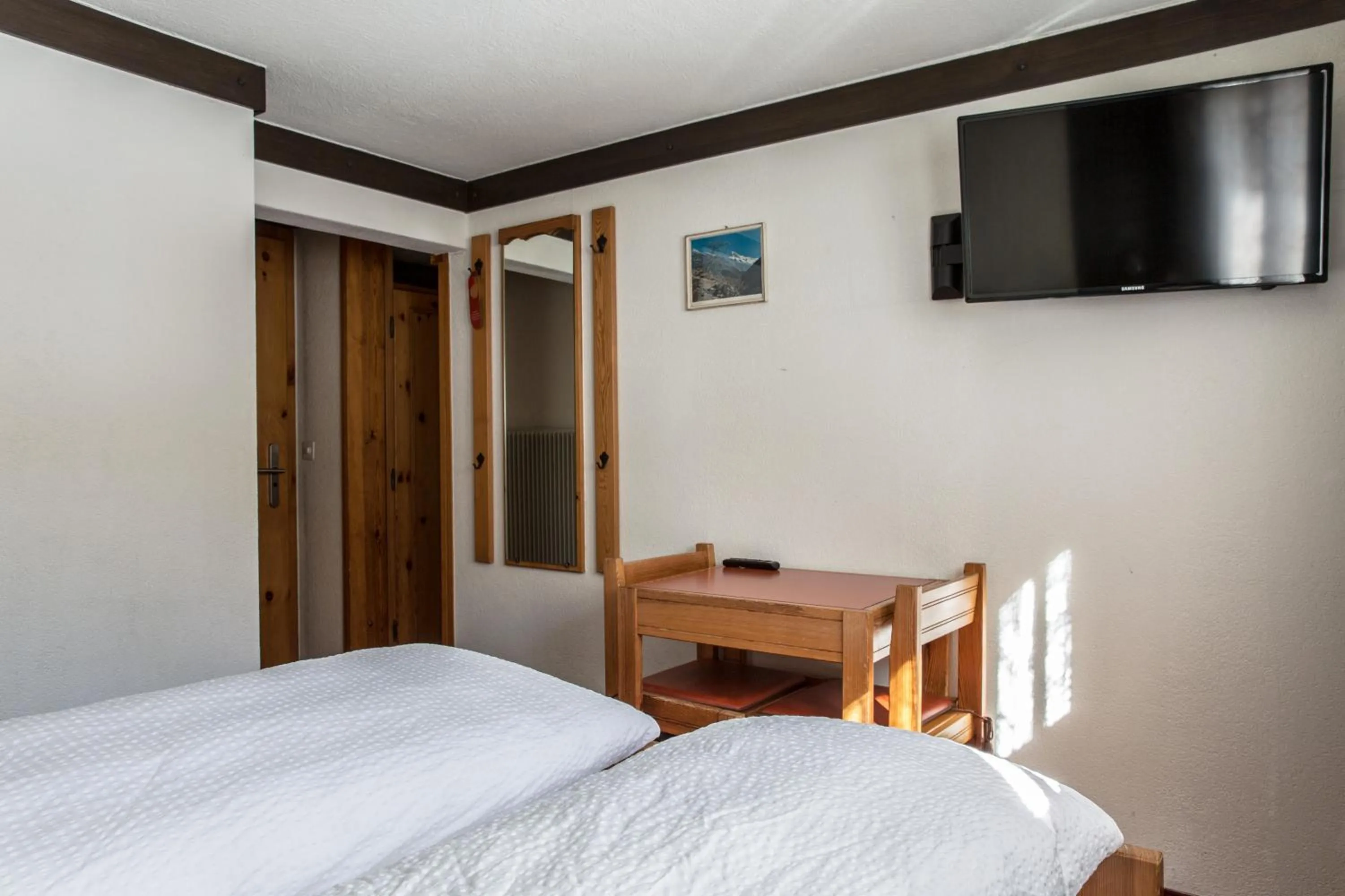 Bedroom, Bed in Hotel Burgener