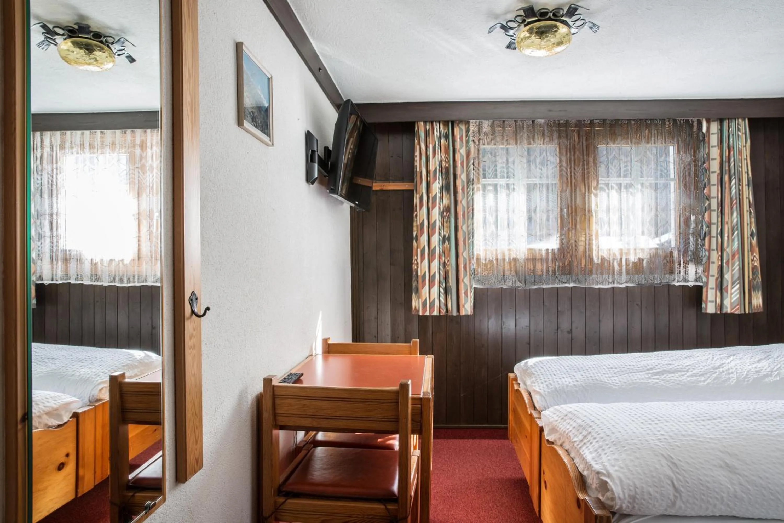 Bedroom, Bed in Hotel Burgener