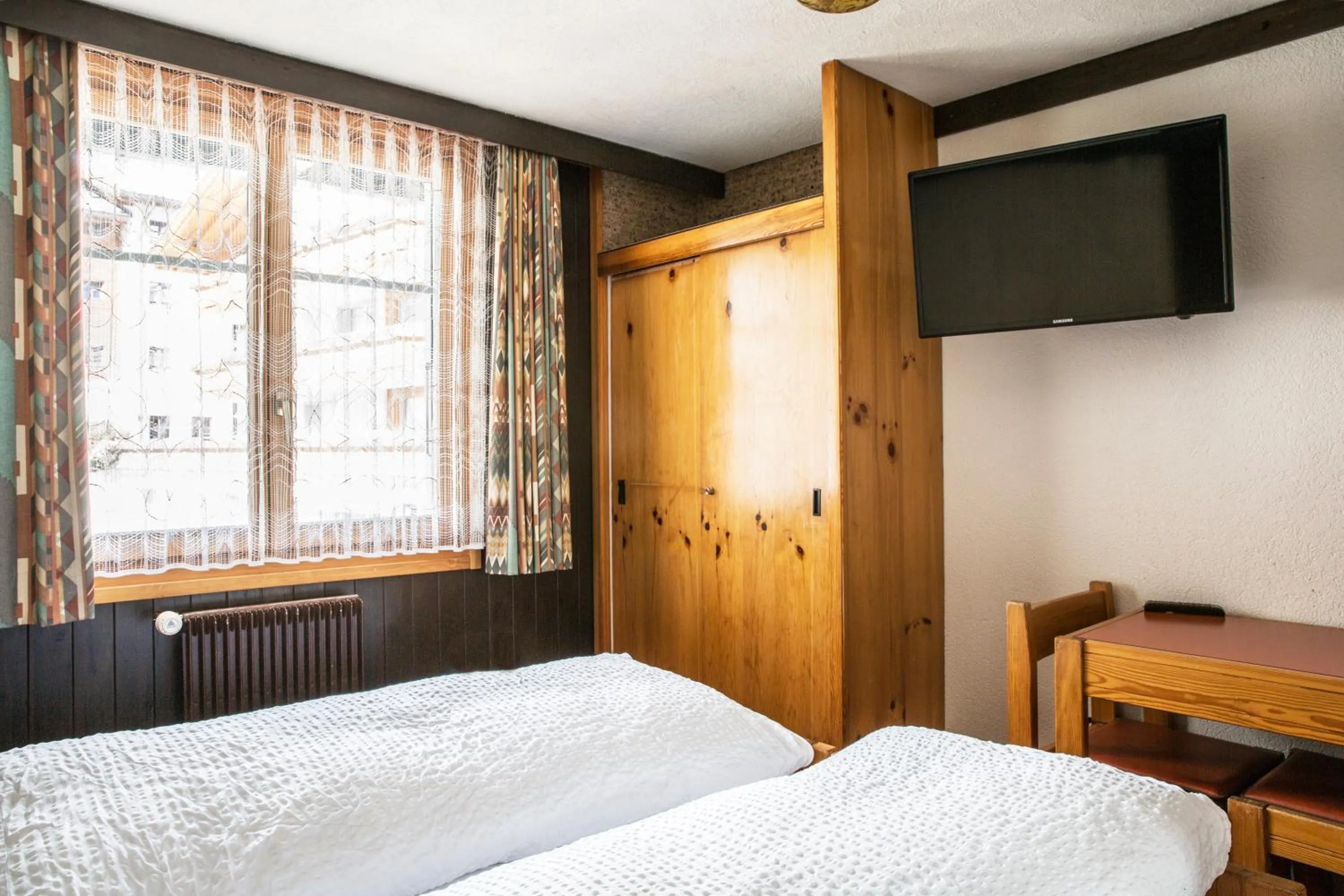 Bedroom, Bed in Hotel Burgener