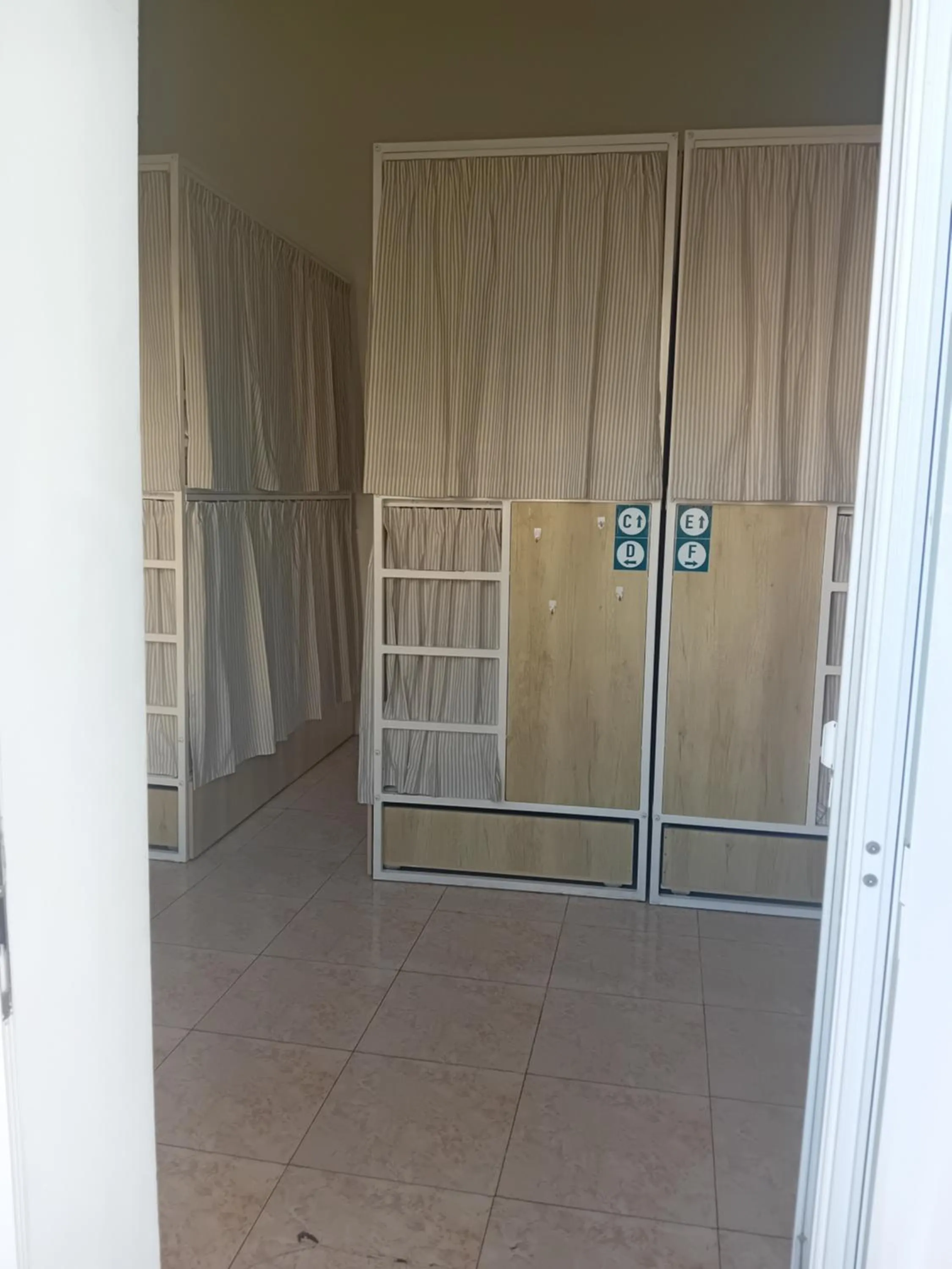 bunk bed in Follow the Sun Boutique Hostel - Pool, Breakfast & Sea Views