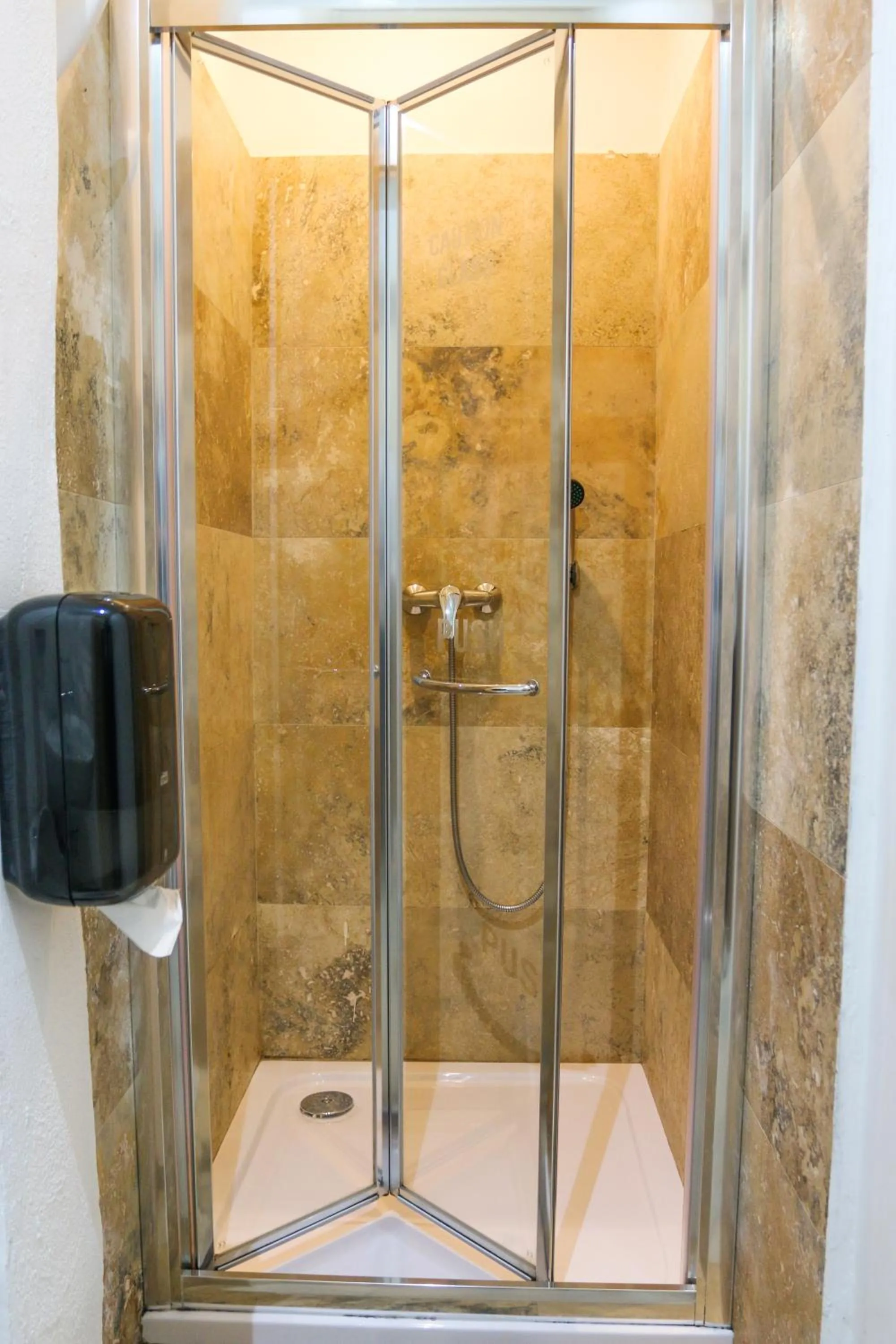 Shower in Follow the Sun Boutique Hostel - Pool, Breakfast & Sea Views
