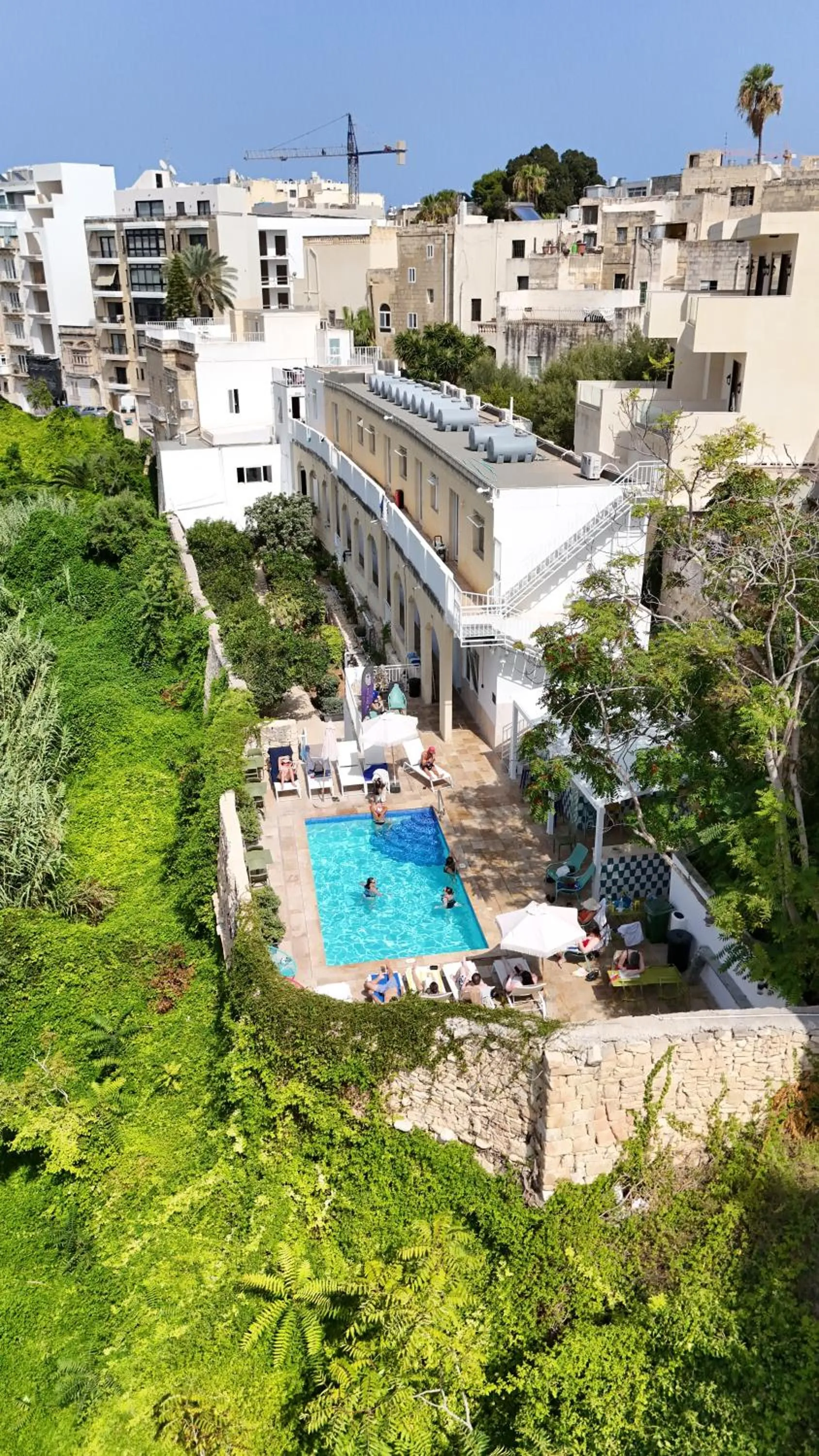 Property building in Follow the Sun Boutique Hostel - Pool, Breakfast & Sea Views