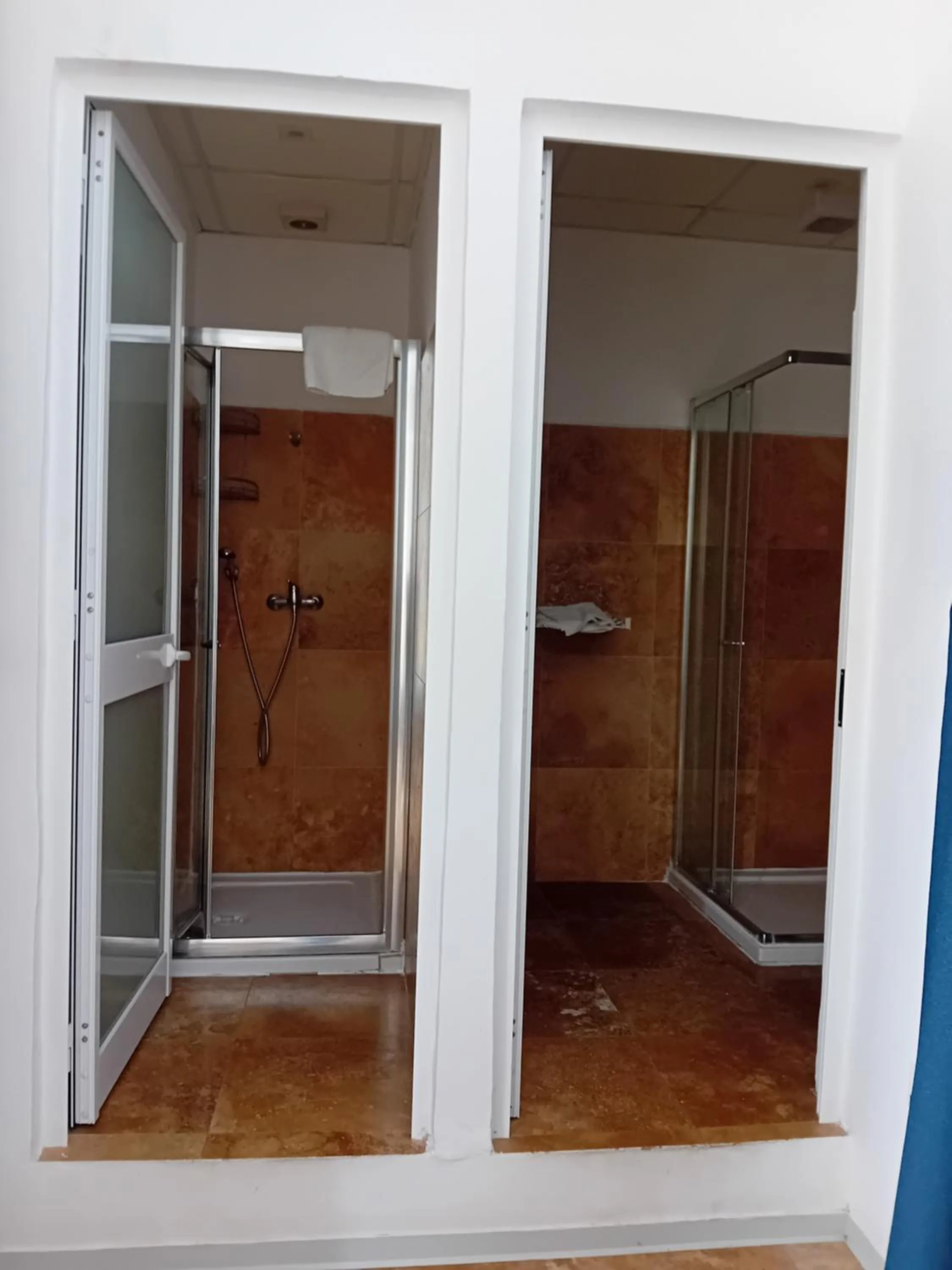 Shower in Follow the Sun Boutique Hostel - Pool, Breakfast & Sea Views