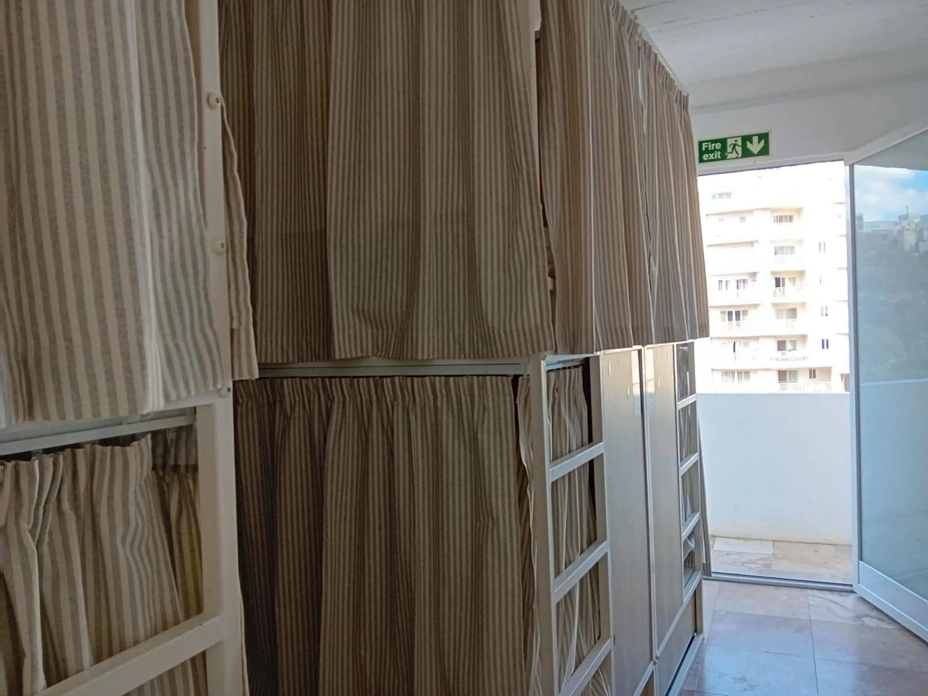 bunk bed in Follow the Sun Boutique Hostel - Pool, Breakfast & Sea Views