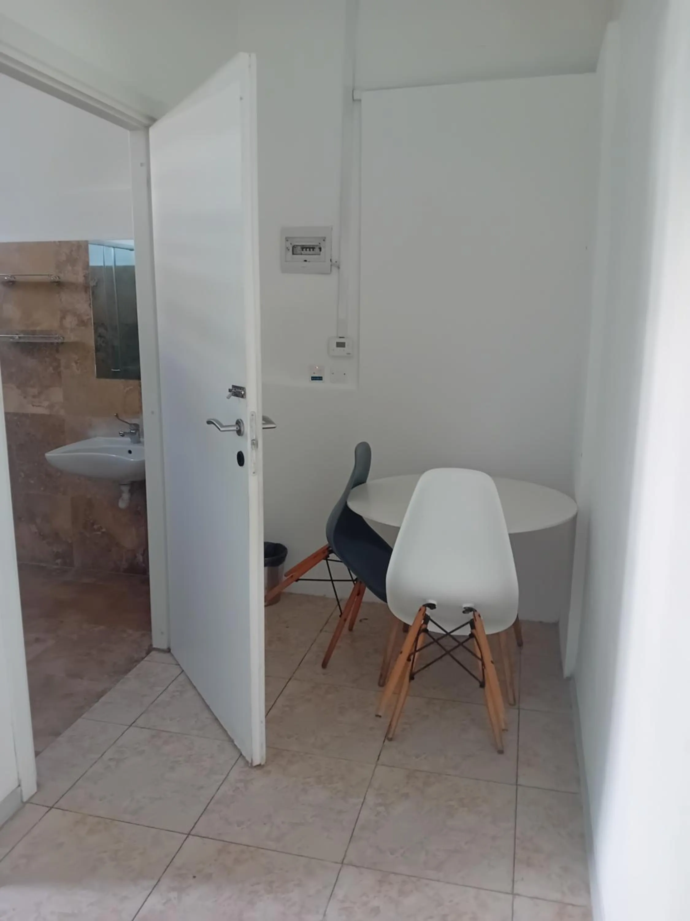 Seating area in Follow the Sun Boutique Hostel - Pool, Breakfast & Sea Views