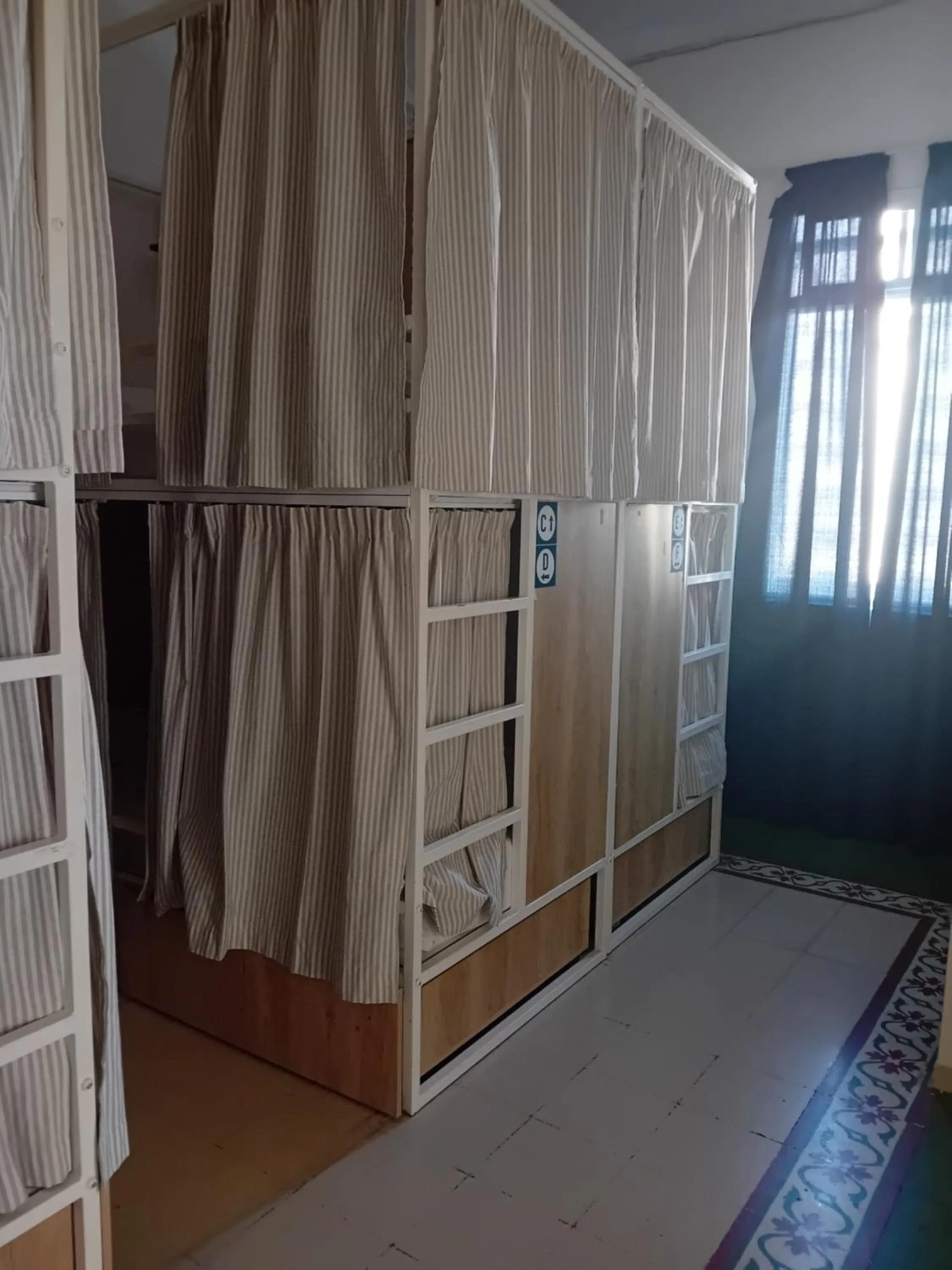 Photo of the whole room, Bed in Follow the Sun Boutique Hostel - Pool, Breakfast & Sea Views