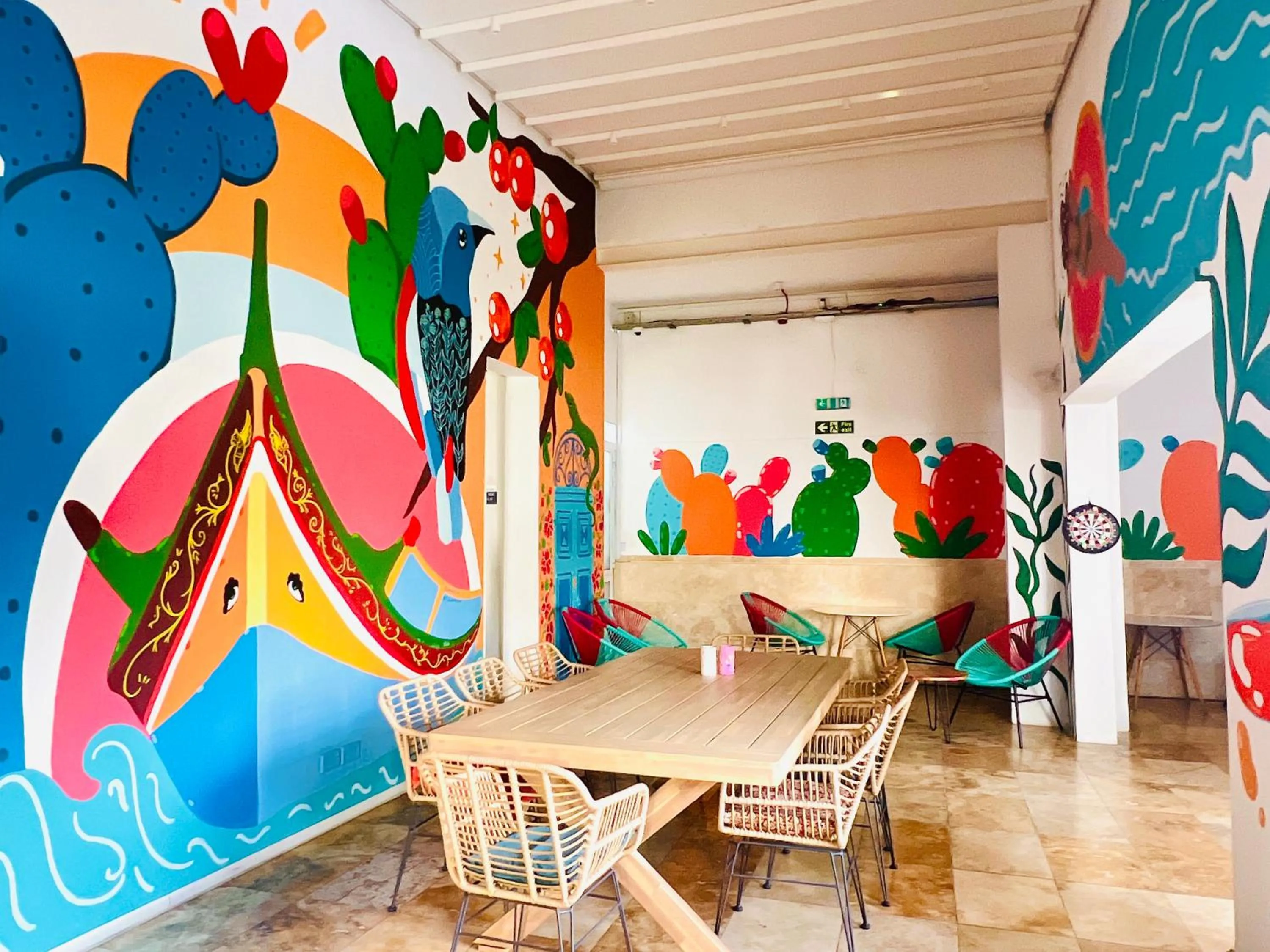 Living room in Follow the Sun Boutique Hostel - Pool, Breakfast & Sea Views