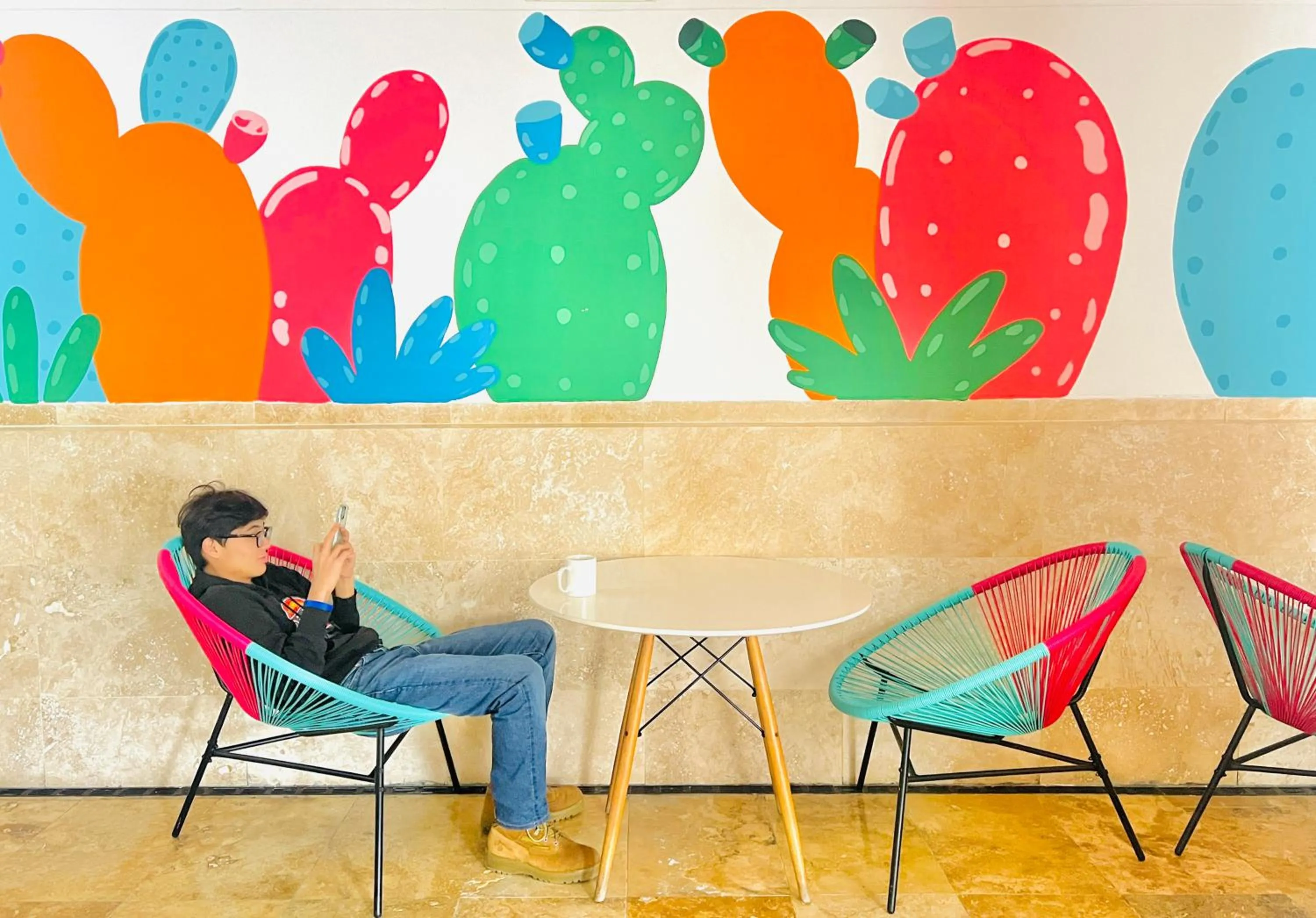 Seating area in Follow the Sun Boutique Hostel - Pool, Breakfast & Sea Views