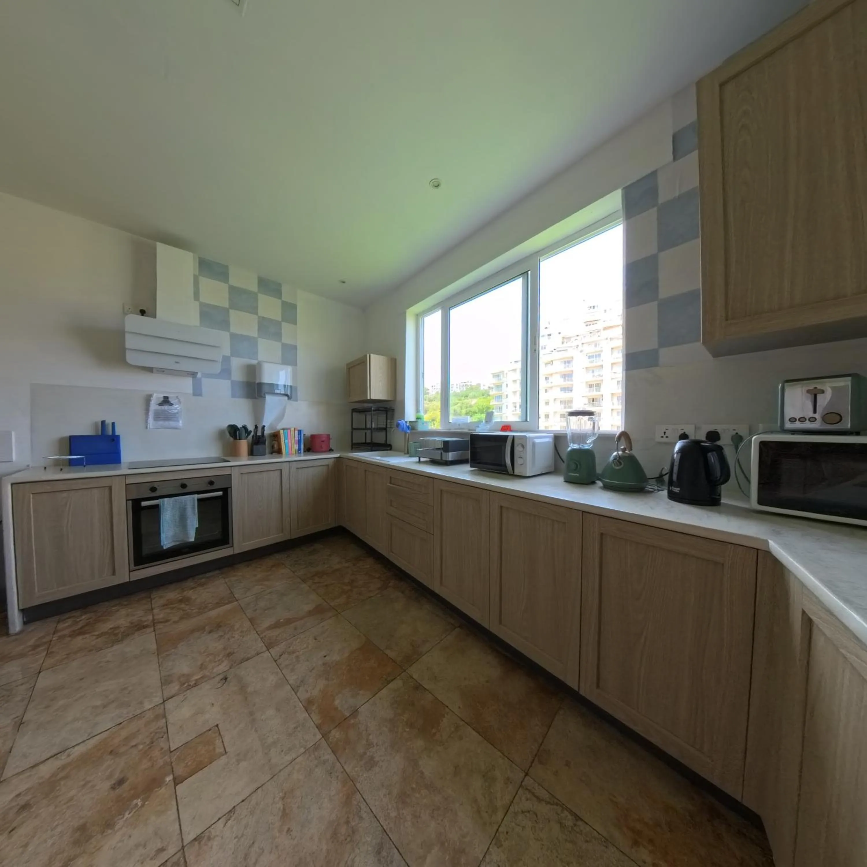 kitchen in Follow the Sun Boutique Hostel - Pool, Breakfast & Sea Views