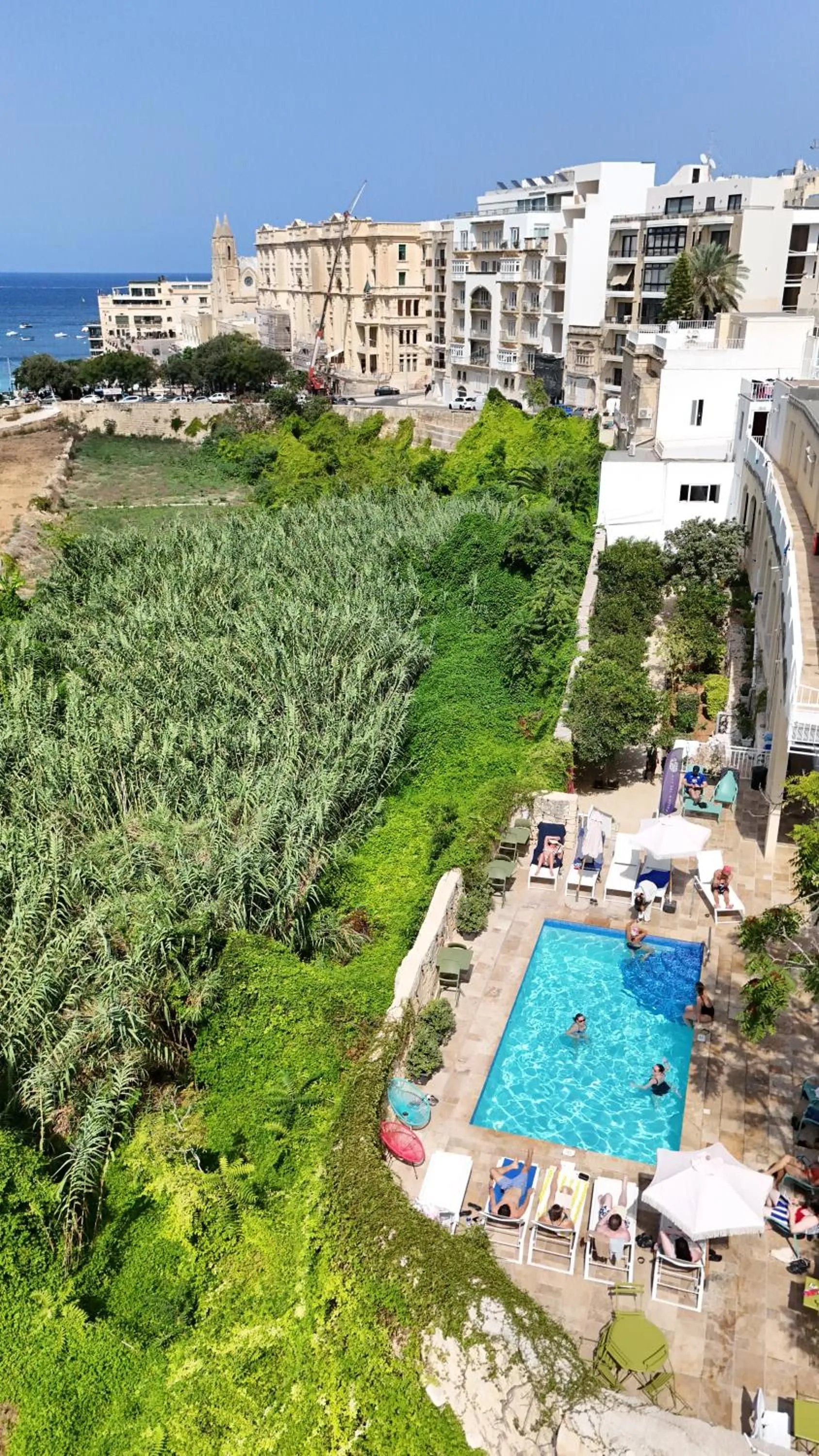 Property building in Follow the Sun Boutique Hostel - Pool, Breakfast & Sea Views