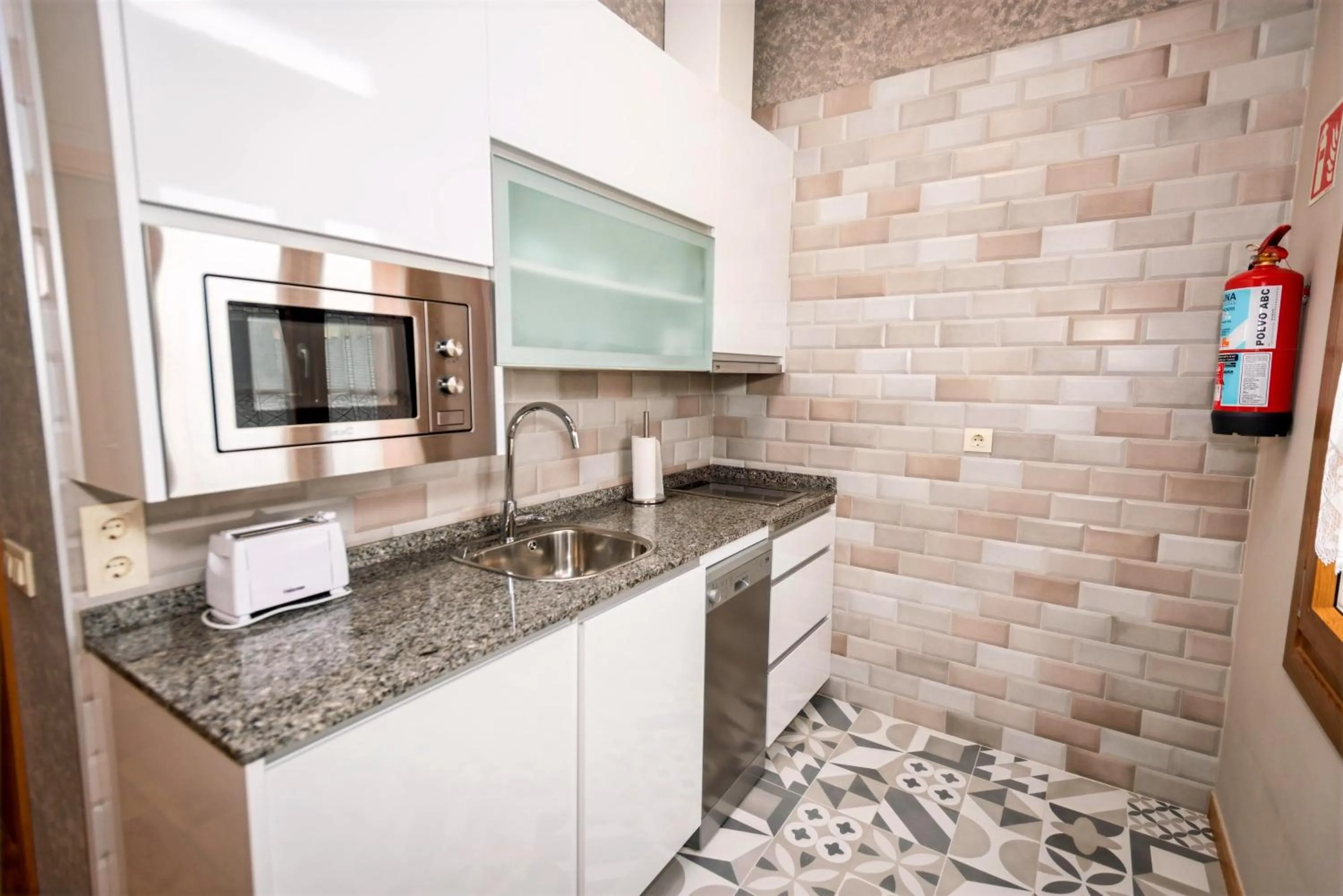 kitchen in Apartamentos Navalin