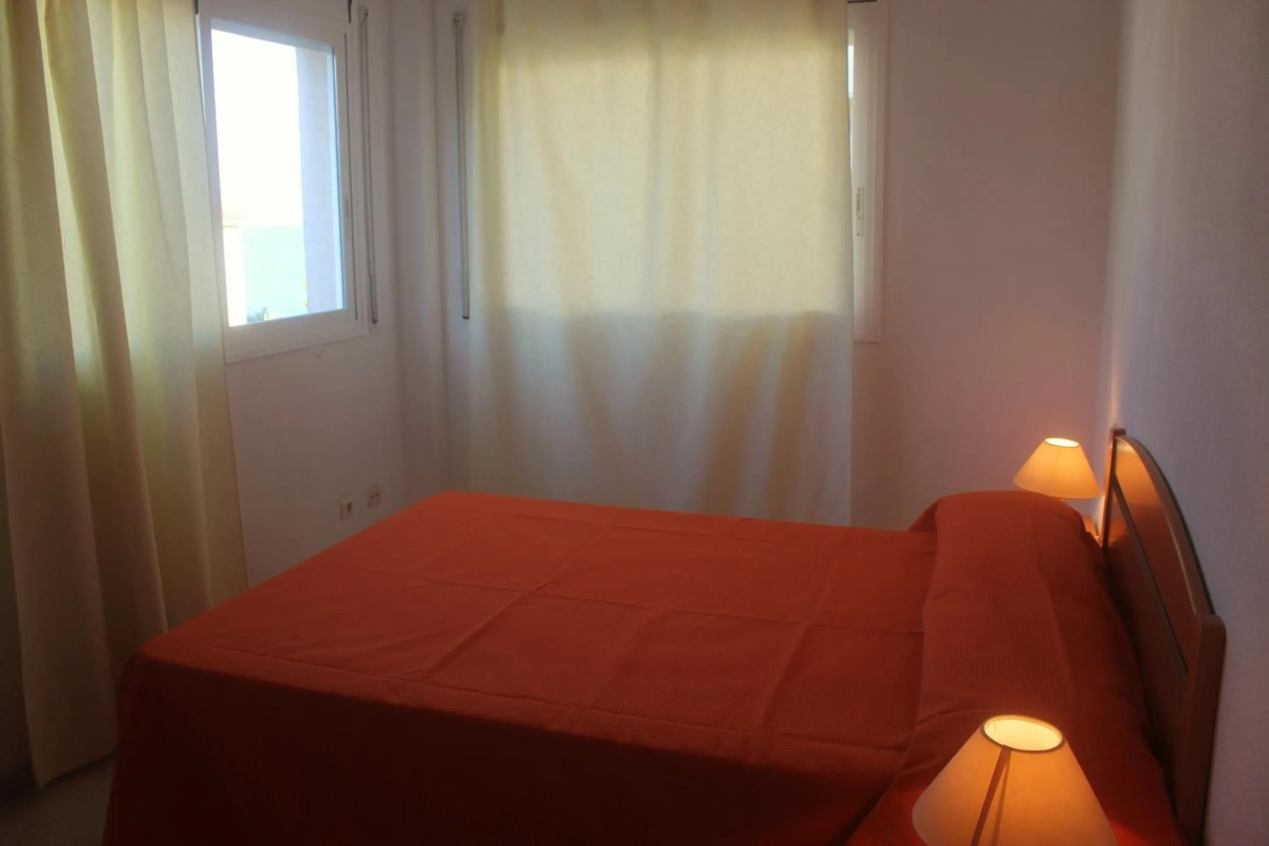 Property building, Bed in JOYAPARTMENTS Calas II