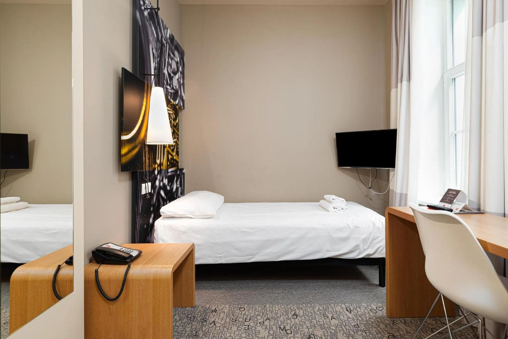 Bed in Ibis Riga Centre