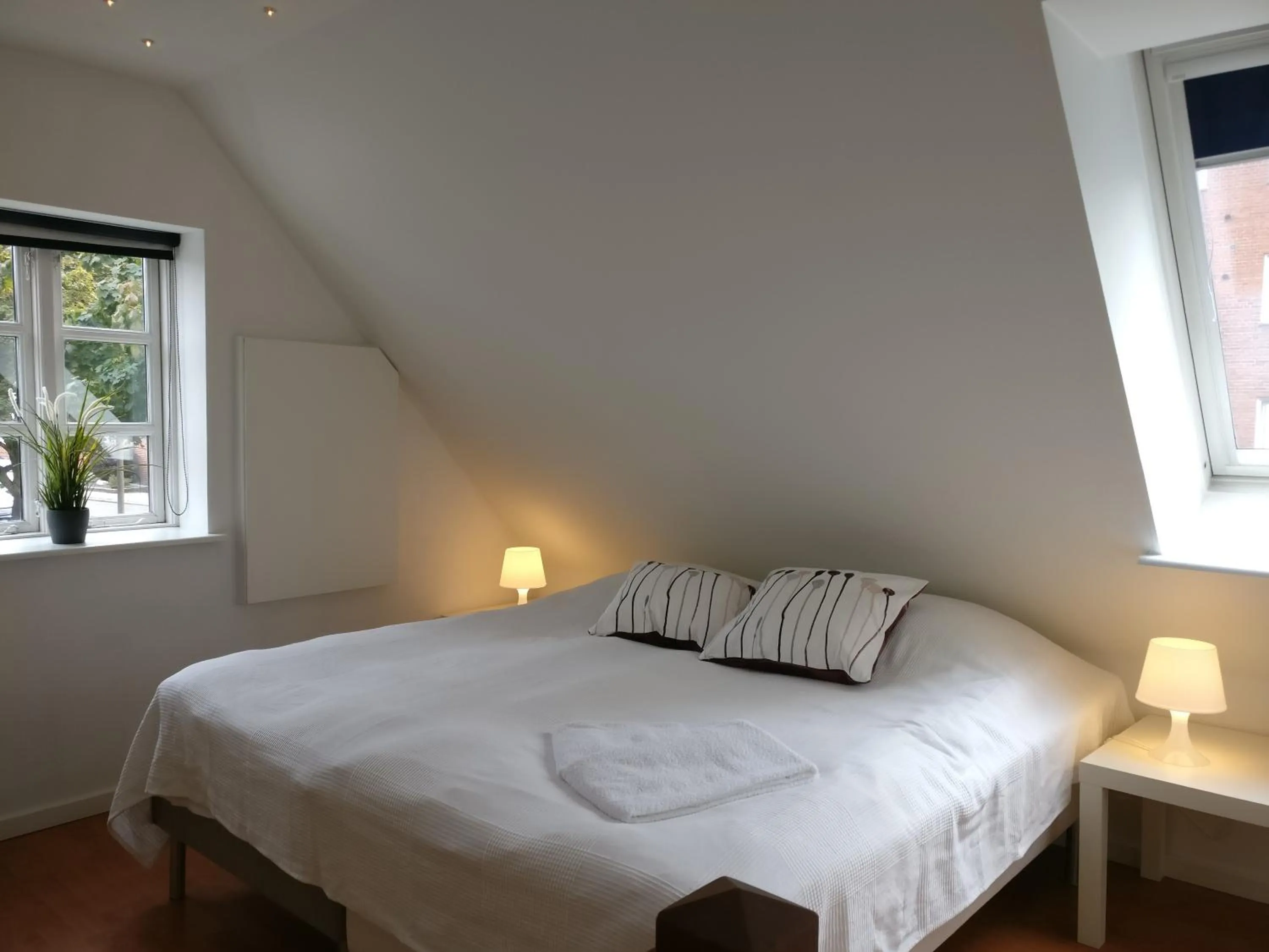 Bedroom, Bed in Aalborg City Rooms ApS