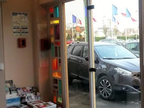 Property building in Hôtel Le Hussard