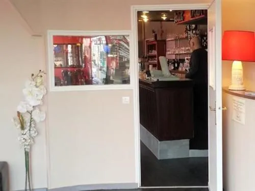 Lobby or reception in Hôtel Le Hussard