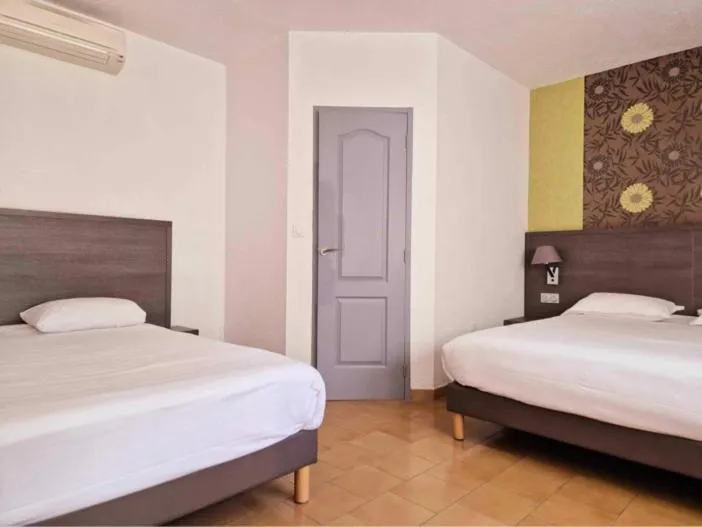 Photo of the whole room, Bed in Logis Hôtel Le Mistral - Restaurant - Montélimar Sud