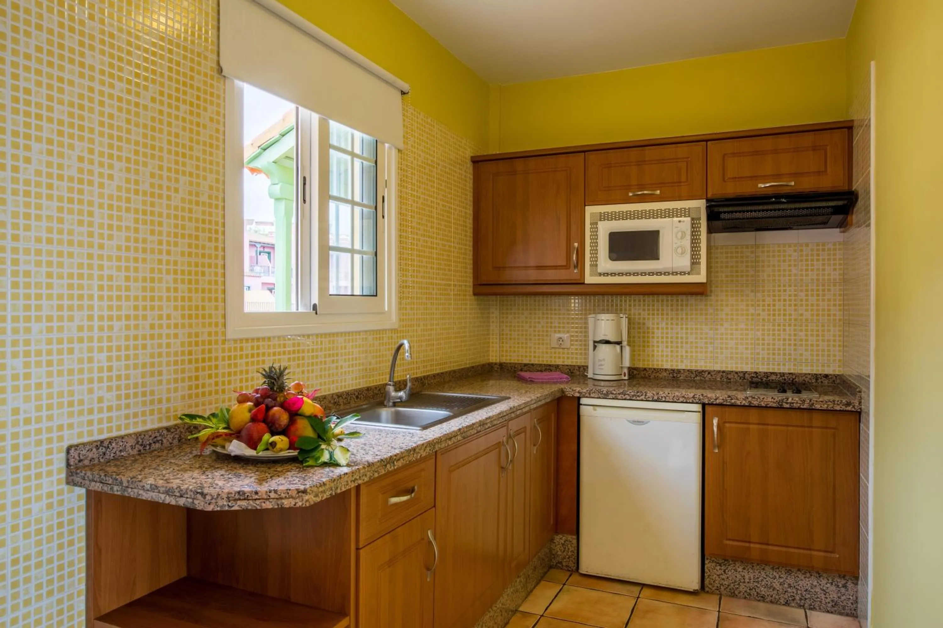 Kitchen or kitchenette in Apartamentos La Caleta