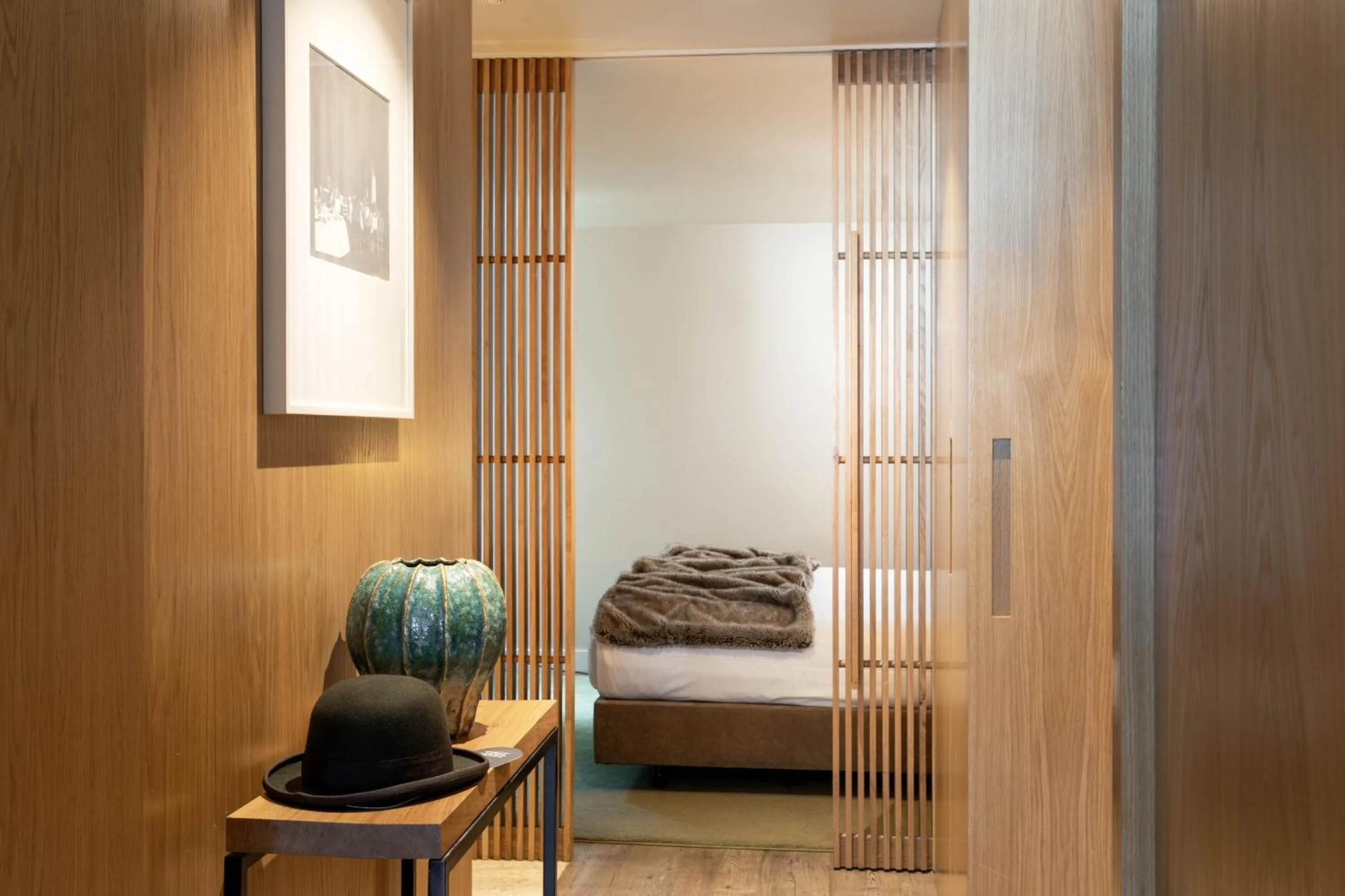 Bed in Memmo Príncipe Real, a Member of Design Hotels