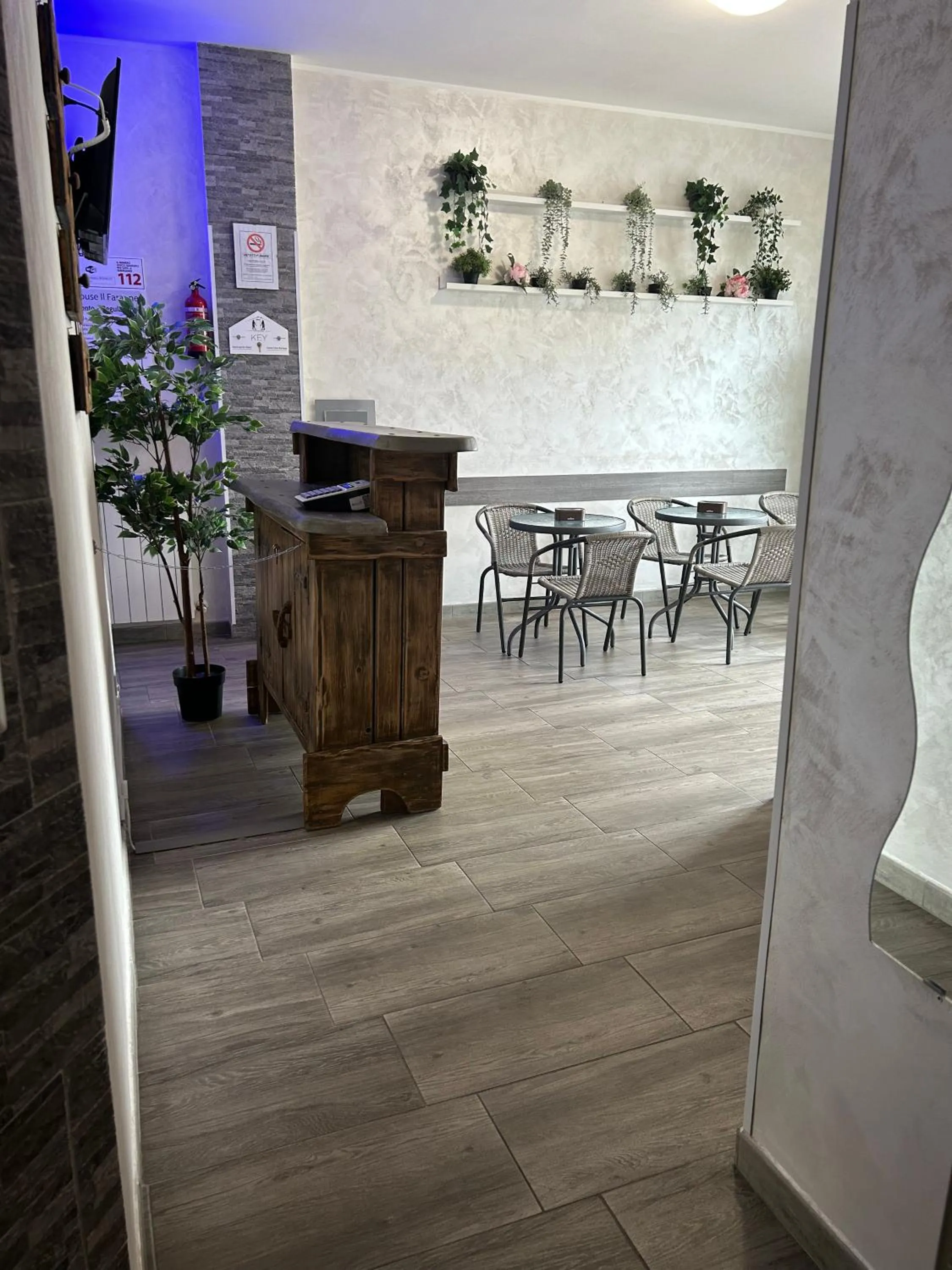 Communal lounge/ TV room in Guest House Il Faraone