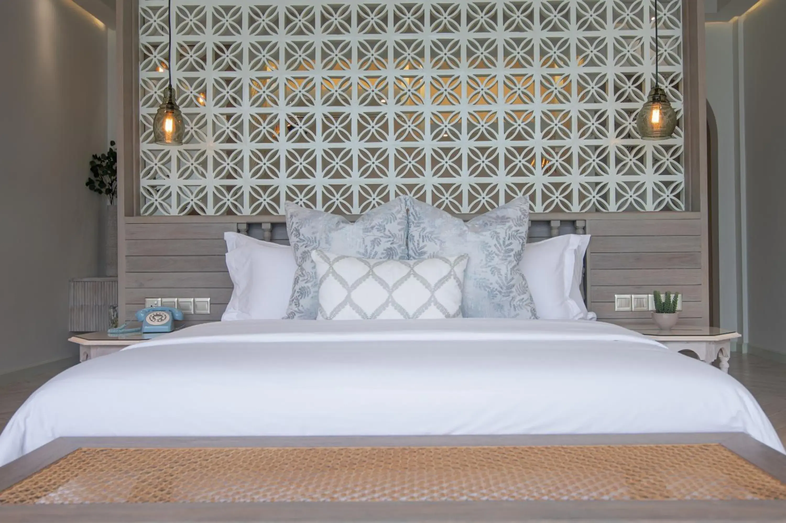 Bed in Malahini Kuda Bandos Resort Bed in Malahini Kuda Bandos Resort