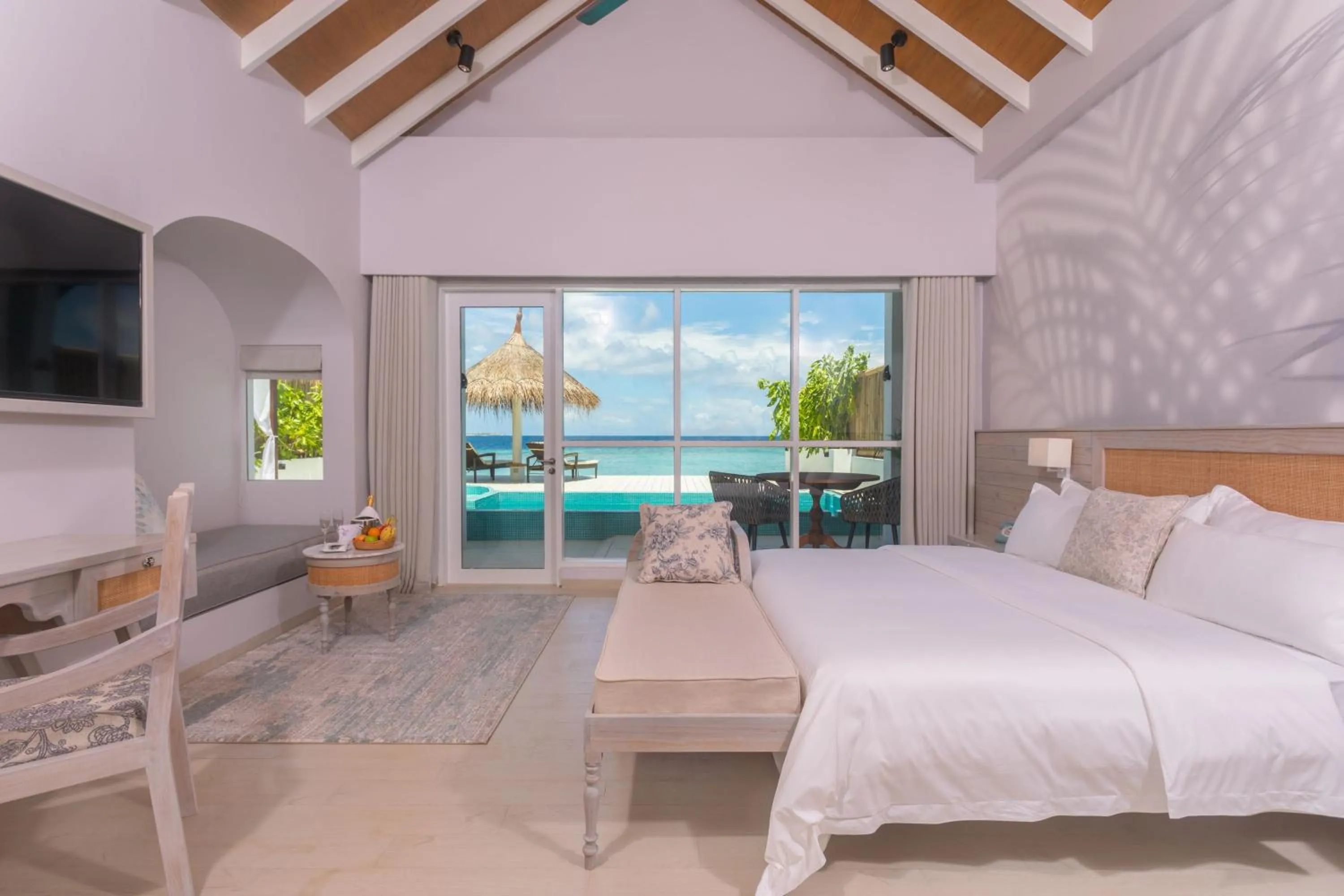 Bed in Malahini Kuda Bandos Resort