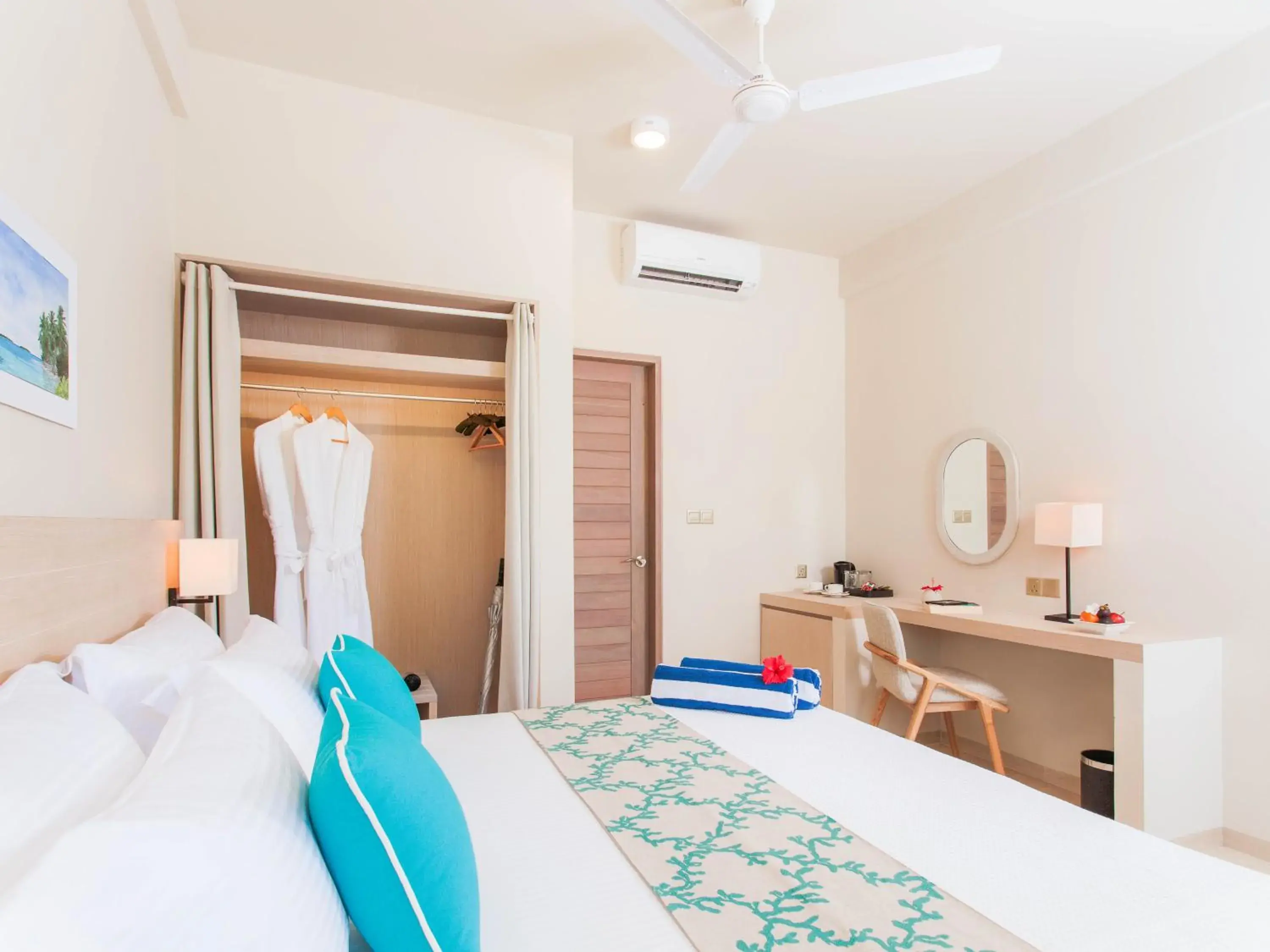 Photo of the whole room, Bed in Malahini Kuda Bandos Resort Photo of the whole room, Bed in Malahini Kuda Bandos Resort