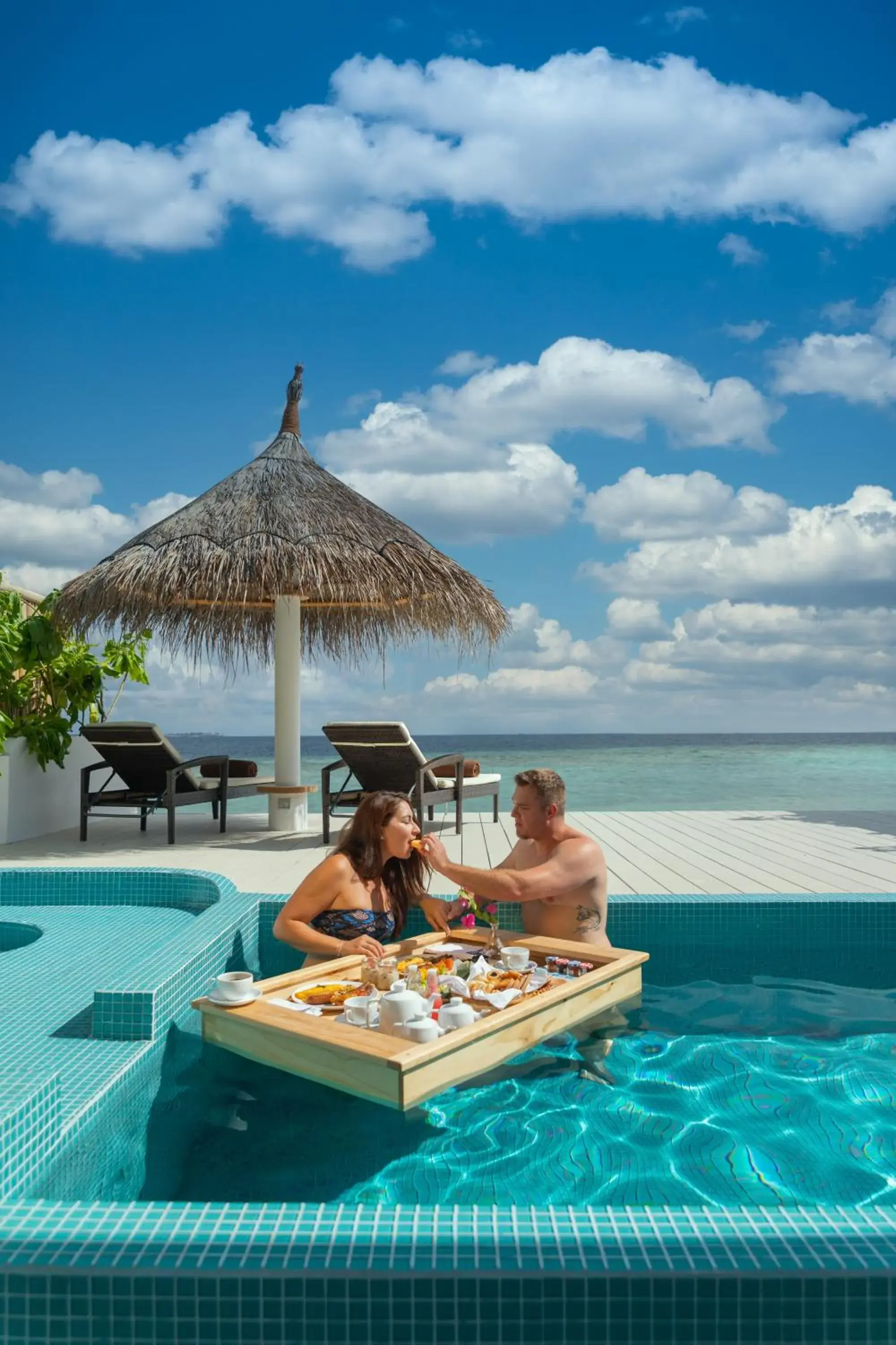 Swimming pool in Malahini Kuda Bandos Resort Swimming pool in Malahini Kuda Bandos Resort