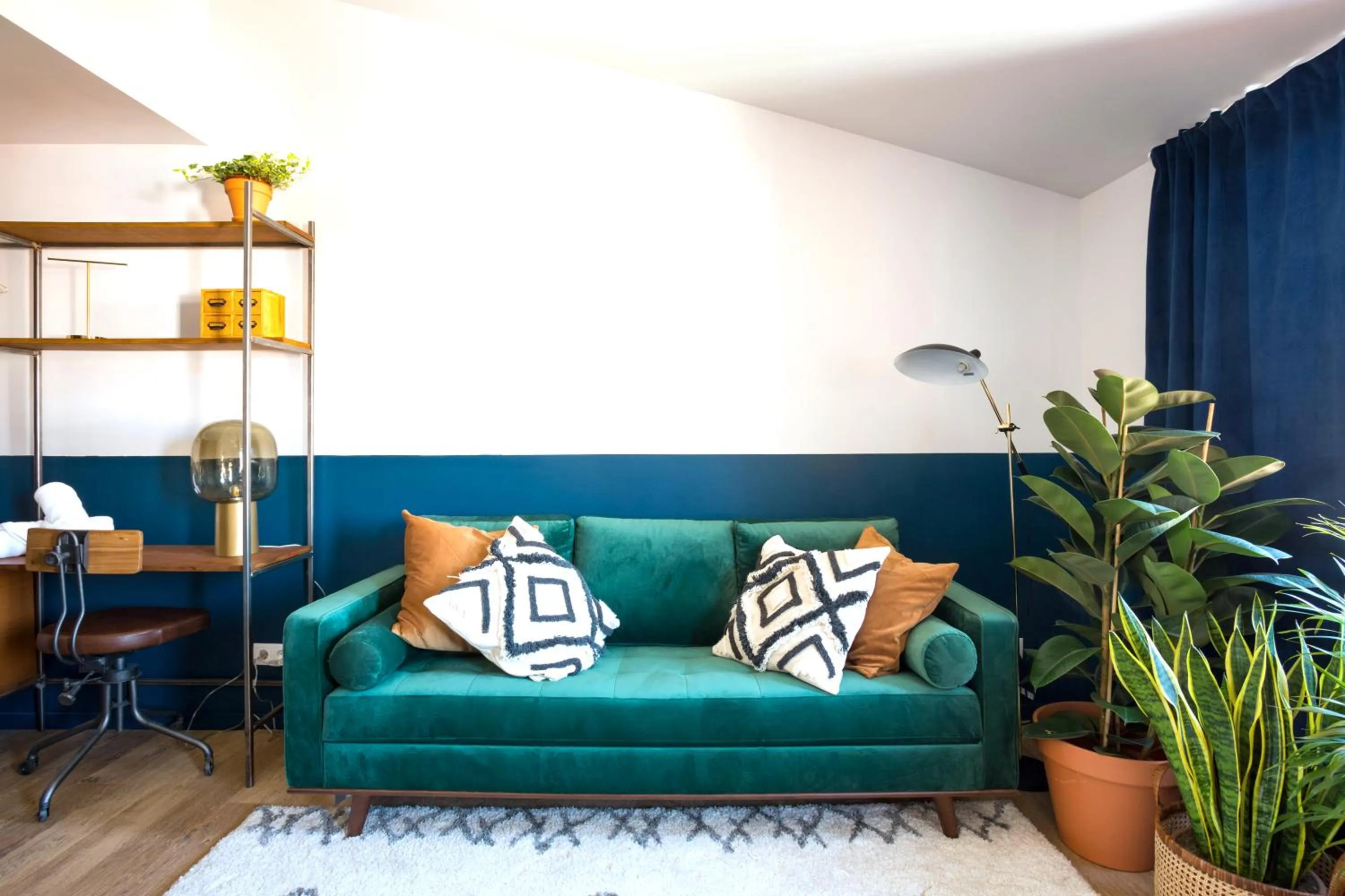 Seating area in Selina Secret Garden Lisbon by IKIGAI Global Hospitality