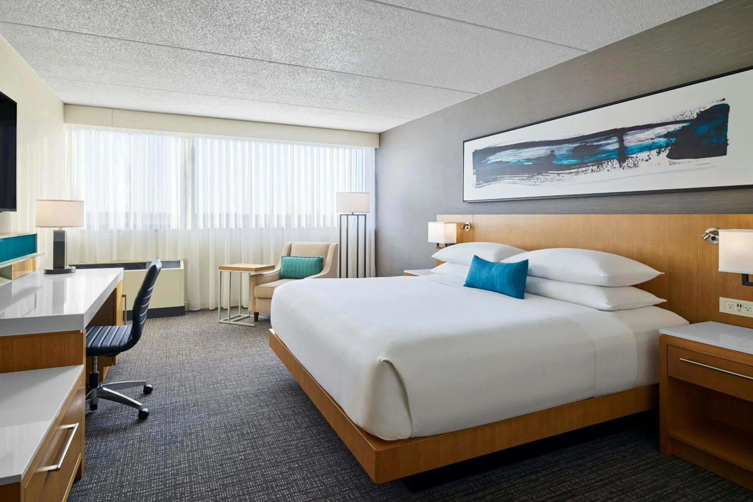 Photo of the whole room, Bed in Delta Hotels by Marriott Muskegon Convention Center