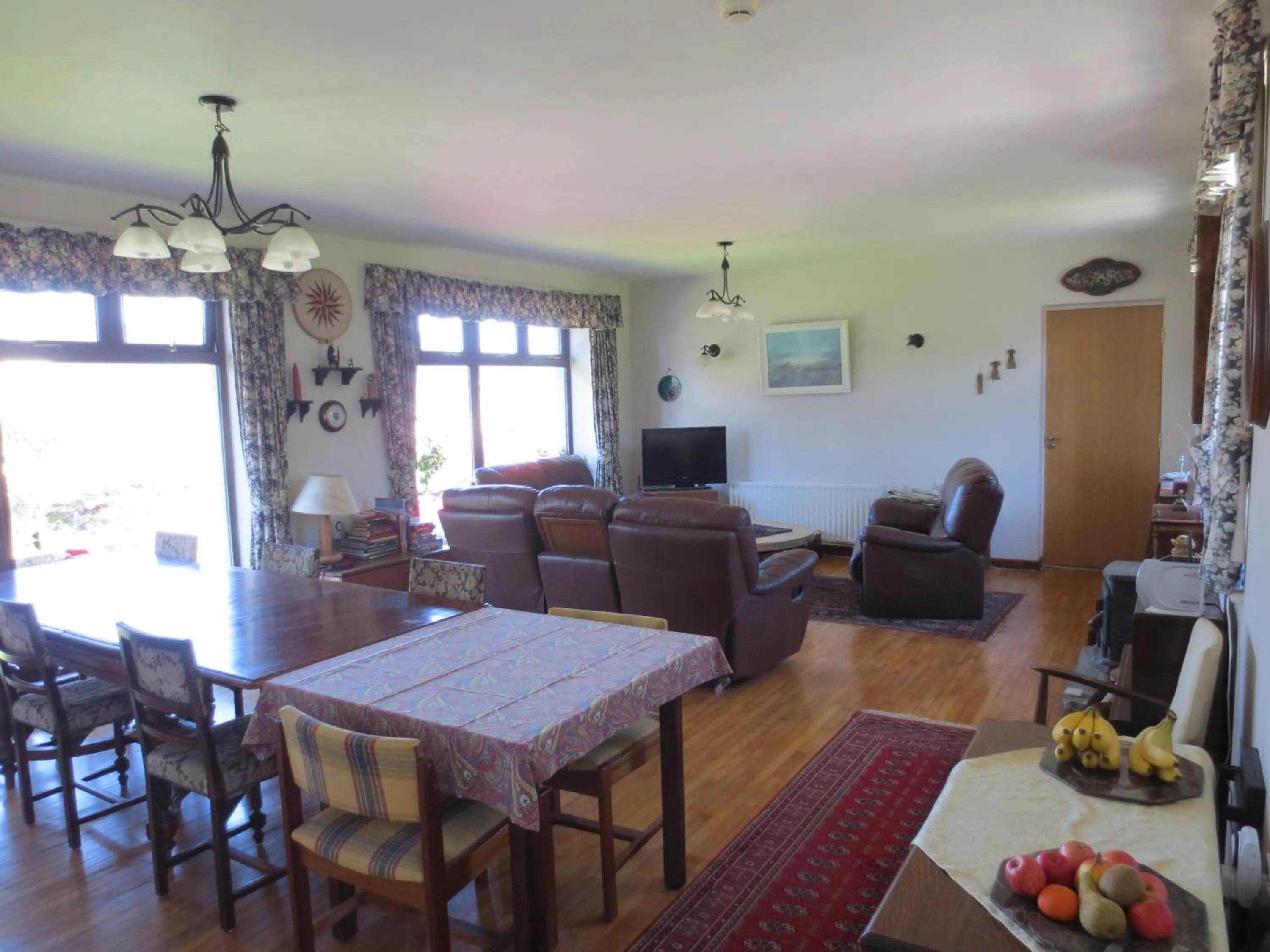 Communal lounge/ TV room in The Stone House B&B