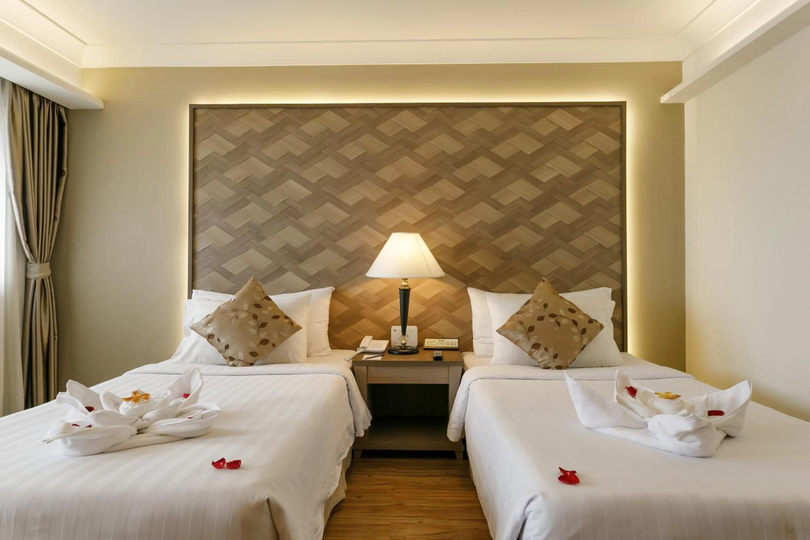 Bed in Amora Thapae Hotel Chiang Mai