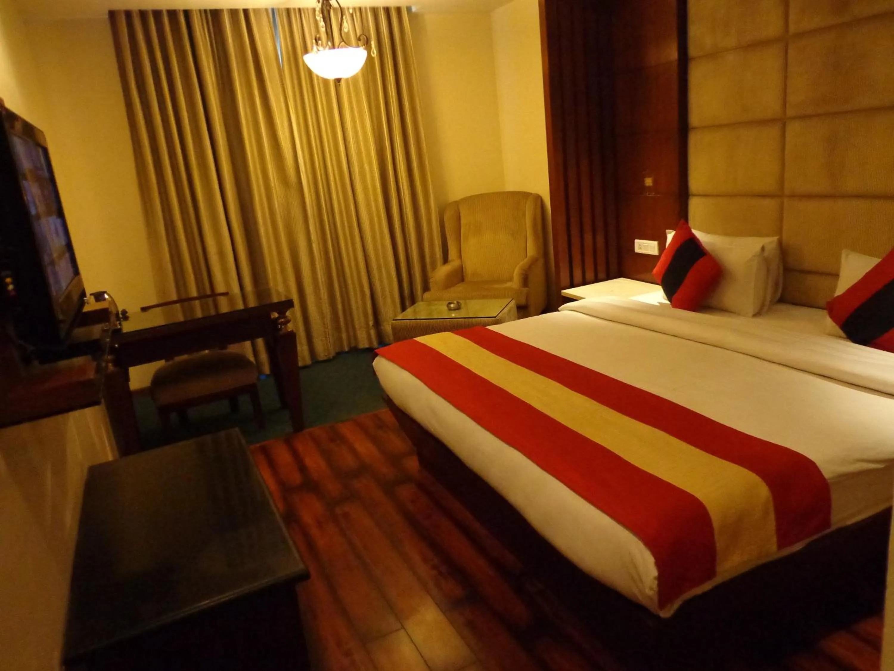 Photo of the whole room, Bed in Hotel Aura - New Delhi Railway Station