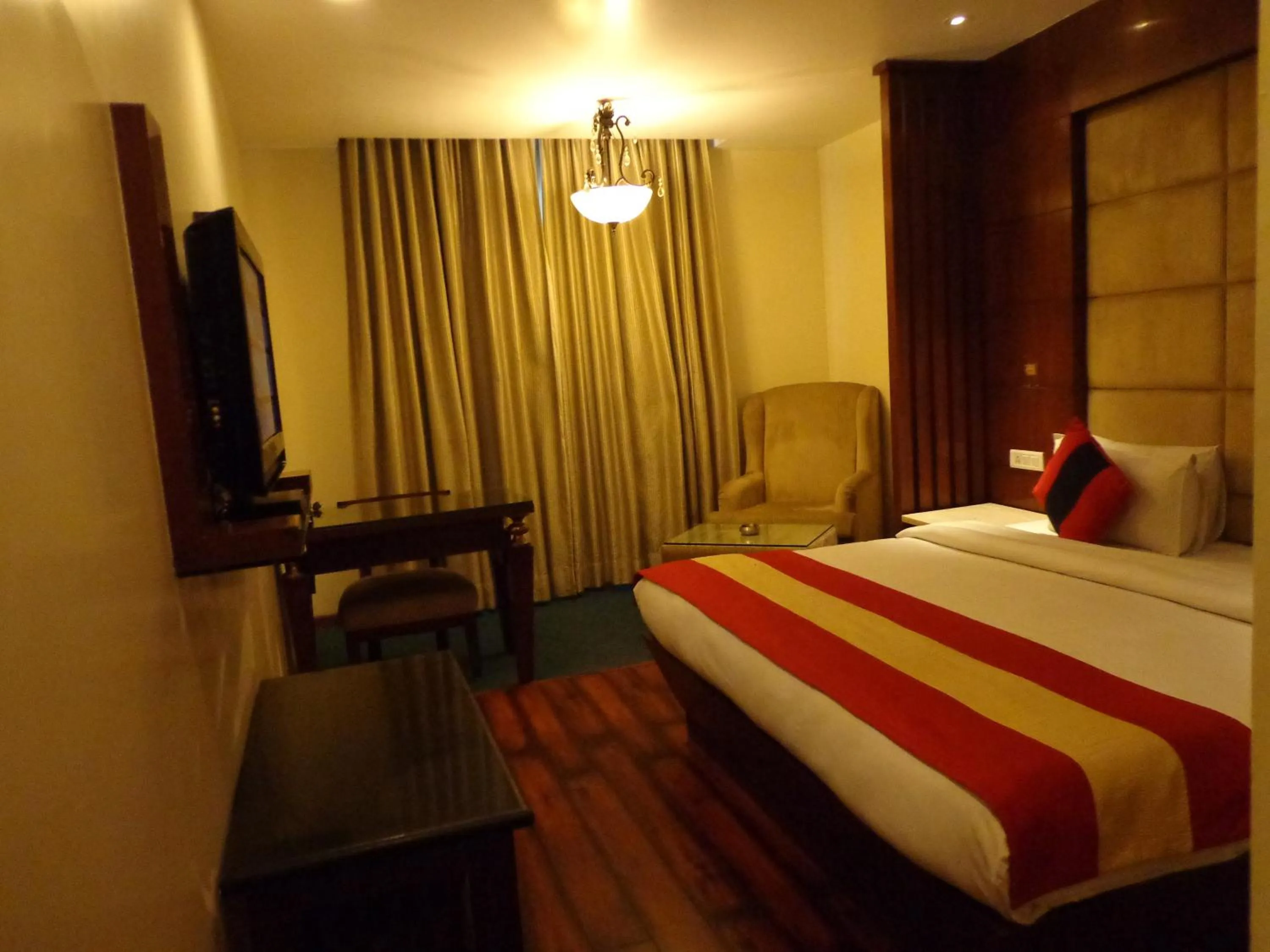 Photo of the whole room, Bed in Hotel Aura - New Delhi Railway Station
