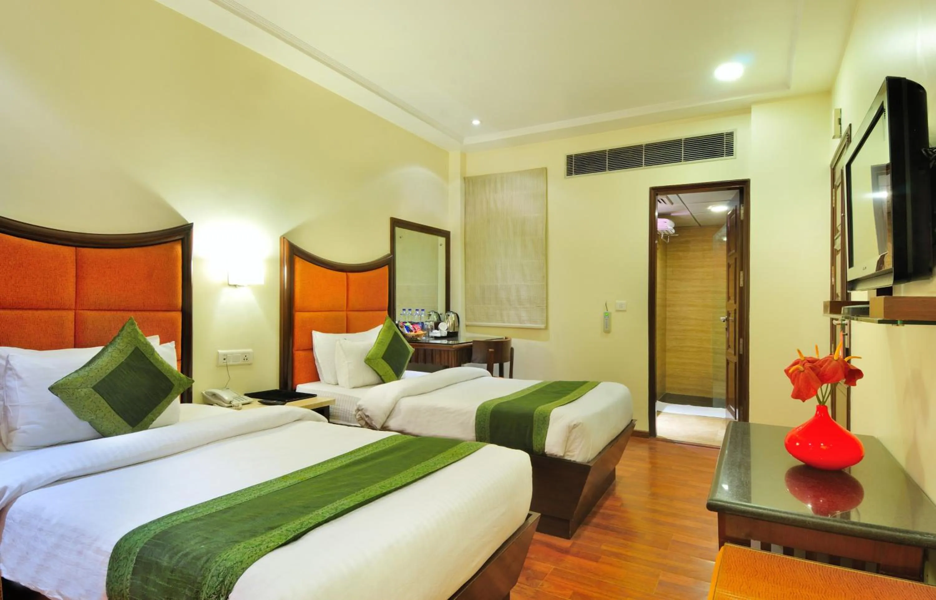 Photo of the whole room, Bed in Hotel Aura - New Delhi Railway Station